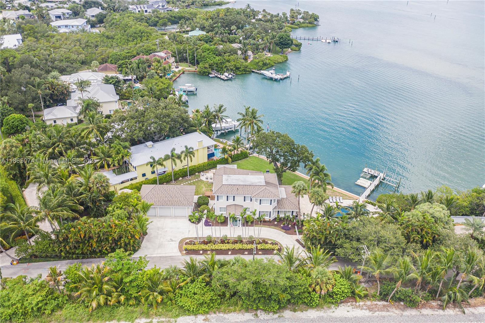PRICE ADJUSTMENT , STEP BACK IN TIME WITH THIS BEAUTIFUL RESTORED RESIDENCE.  COMPLETELY RENOVATED  AND BROUGHT UP TO TODAYS STANDARDS. SITTING ON  ( .50 AC )  THE PRISTINE BLUE WATERS OF THE LOXAHATCHEE RIVER ( 141 FEET )  WITH ITS BREATHTAKING VIEWS AND VISTAS. THIS  HISTORIC BLEND AND MODERN LUXURY IS A PERFECT EXAMPLE OF ELEGANCE AND TIMELESS CHARM , WHICH MAKES THIS PROPERTY ( .50 AC. )  VERY UNIQUE. LANDS END IS WITHOUT QUESTION THE MOST DESIREABLE WATERFRONT ( BAHAMA BLUE )  ENCLAVE  IN  PALM BEACH COUNTY.  NEW POOL ( 2024 ) WITH GUNITE / PEBBLE TECH  / 10 PERSON HOT TUB AND A BAHA SHELF. OVER SIZED THREE CAR GARAGE WITH  LIFT  . JUPITER INLET IS A LEISURELY  BOAT RIDE  WITH CHARMING  WATERFRONT RESTURANTS AS WELL. CALL LISTING BROKER, DANIEL TAYLOR  FOR ALL SHOWINGS AND ADDITIONAL INFORMATION.