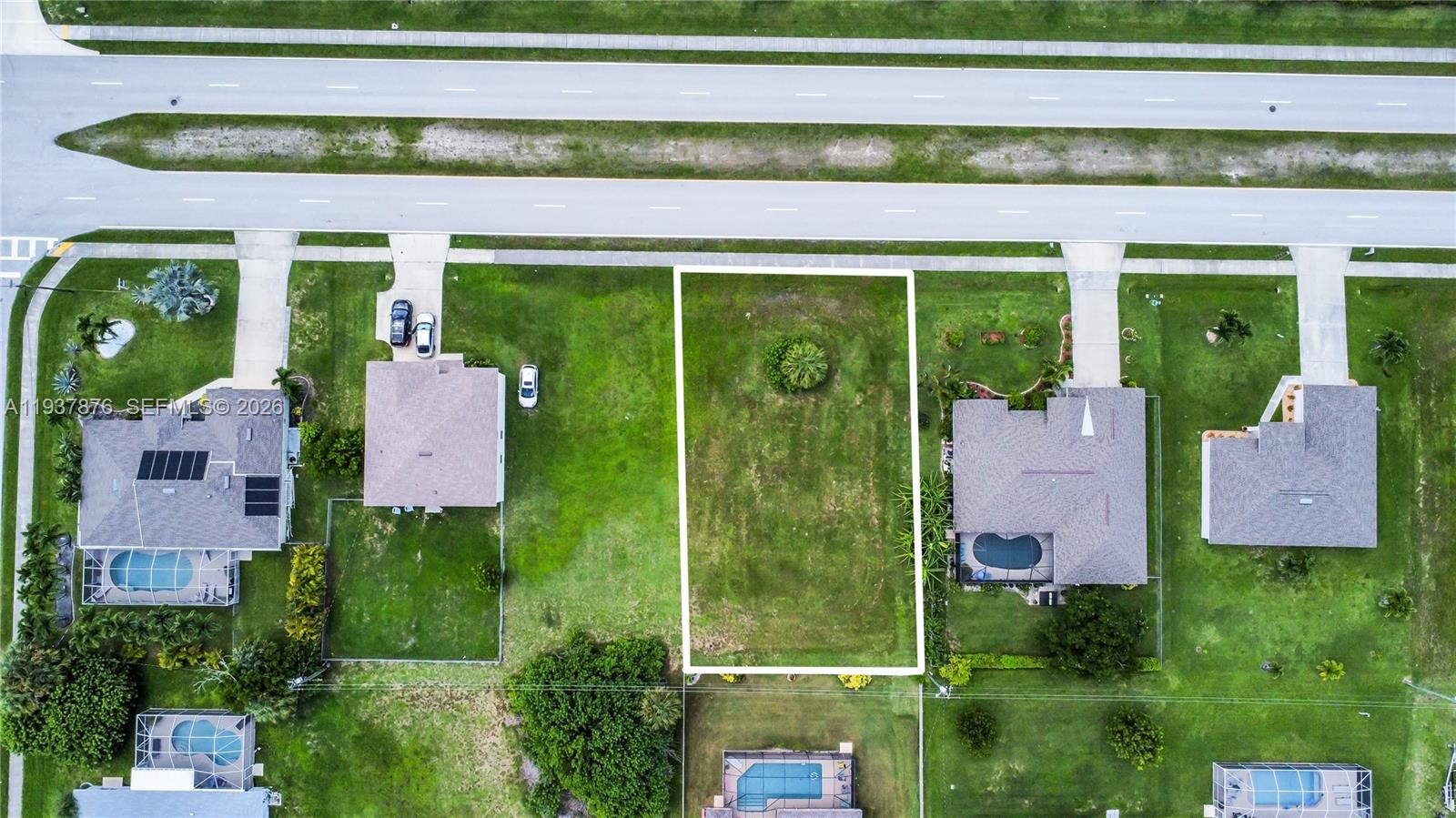 Take advantage of the opportunity to purchase a 10,000 sq. ft. lot located in a well established and highly desirable area of Cape Coral. This generously sized parcel is ideal for new construction and offers a convenient location close to schools, shopping, dining, and local amenities, making it a great option for building your future home.