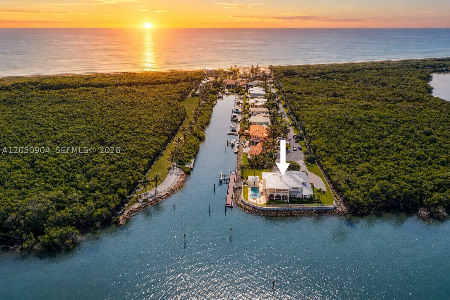 Sailfish Capital of the World!! One of Hutchinson Island's gated premier deep-water Intracoastal estates, offering nearly an acre on a private point lot encompassing the entire cul-de-sac with preserves bordering both sides for unmatched privacy. Boasting approximately 270 feet of protected Intracoastal waterfront, this estate captures breathtaking wide-water views throughout the home. Located minutes to the Saint Lucie Inlet.
Designed to maximize the spectacular setting, the residence features a first-floor primary suite with panoramic Intracoastal views, expansive living spaces, and seamless indoor-outdoor living. Boaters will appreciate the deep-water dockage for large vessels, 100+ feet of composite dockage, 40,000-lb boat lift, and a professionally engineered 15-foot polyurethane seawall with a poured concrete cap and riprap reinforcement for superior shoreline protection.
A rare opportunity to own one of Jensen Beach's premier waterfront properties, offering expansive Intracoastal views, exceptional boating amenities, and an unparalleled private point-lot setting. Beautifully updated 5BR/5.5BA residence built with solid concrete block construction, high-impact windows and doors, and a durable 50-year aluminum roof. The chef’s kitchen features premium Thermador appliances, including a gas cooktop, opens to elegant living spaces with a gas fireplace. The first-floor primary suite offers privacy, while all guest bedrooms feature en-suite baths.