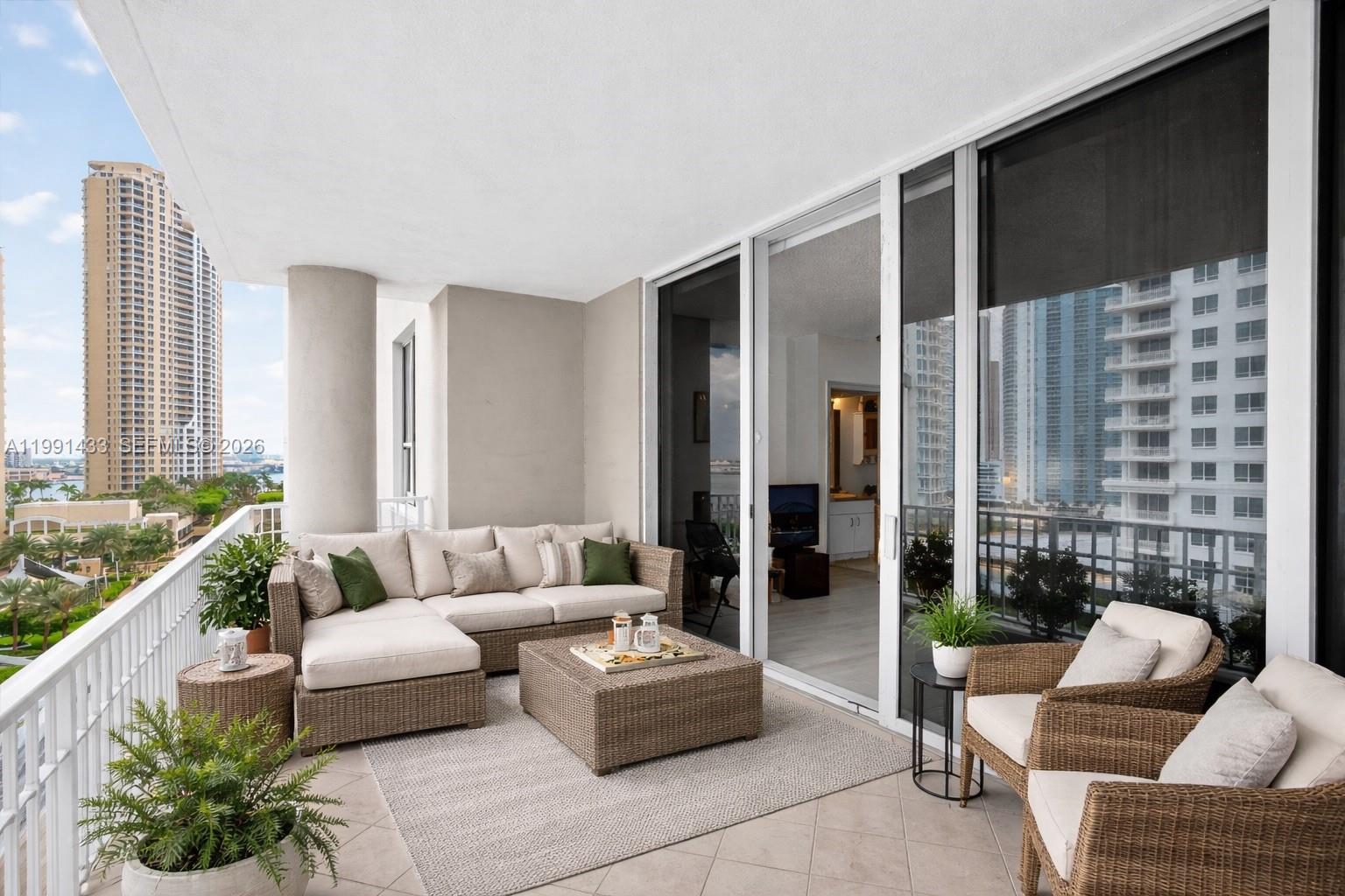 Stunning condo with bay and city views. ONLY 3% down payment required for approved buyers, PLUS seller is offering a RATE BUY-DOWN to help reduce the buyer’s monthly payment. This open layout residence features an expansive living and dining area, a spacious primary suite with ensuite bath, a convenient guest powder room, and a deep terrace ideal for entertaining or enjoying the bay and skyline views. Enjoy resort-style amenities including a bayfront pool, state-of-the-art fitness center, and waterfront promenades perfect for sunrise or sunset strolls along Biscayne Bay. Priced below recent comparable sales in the building, offering immediate value!! Pictures virtually staged.