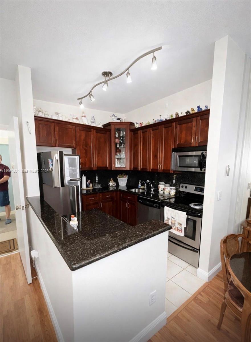 Resort-style amenities, quiet and well-maintained community, perfect for full-time or seasonal living. Beautiful 2BR/2BA condo with spacious open layout, updated kitchen, stainless steel appliances, and low-maintenance flooring throughout. Large primary suite with plantation shutters. Private balcony overlooking the pool with custom shades. 55 plus community. Motivated sellers—bring all offers!