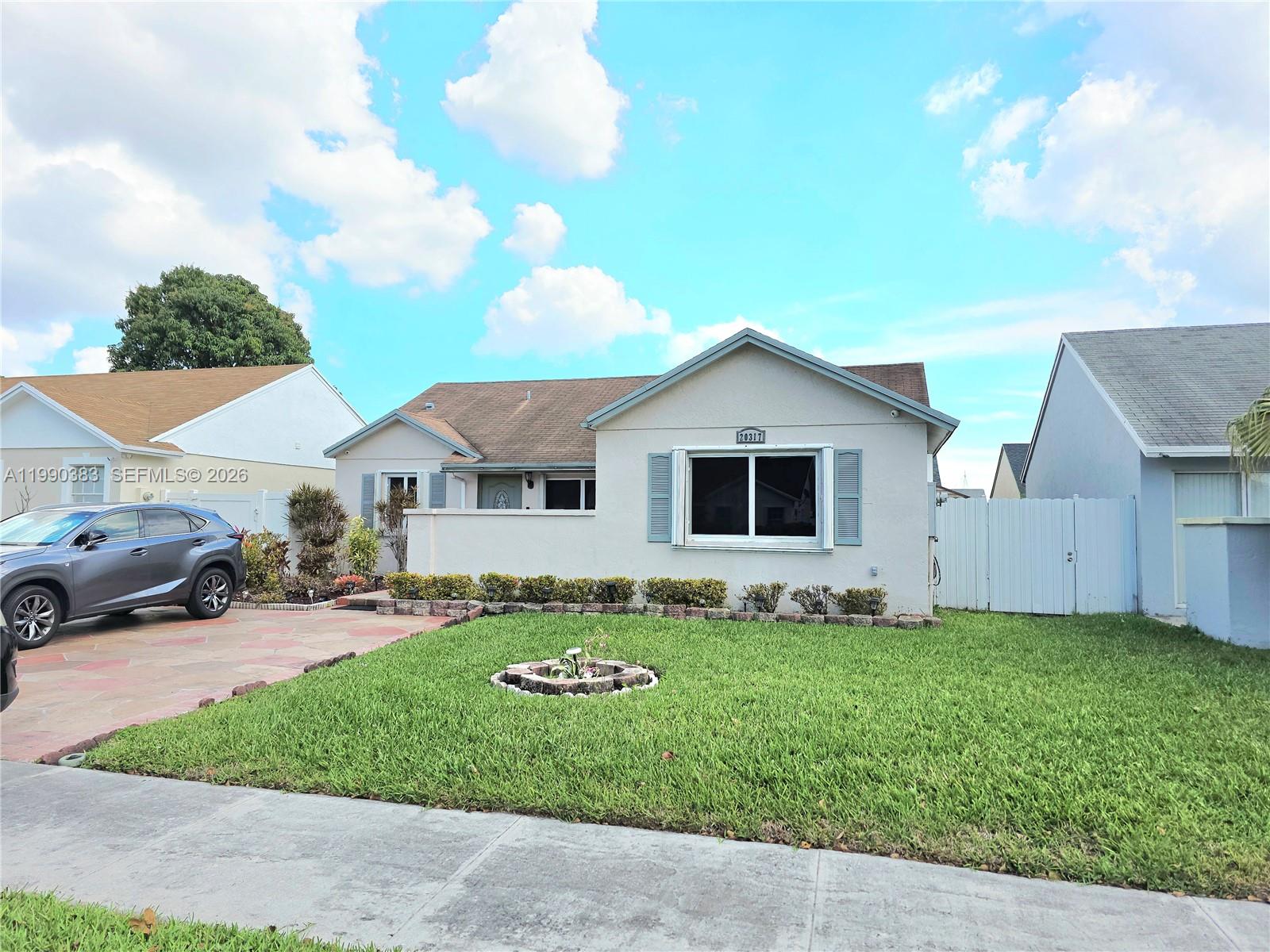 Get ready to fall in love with the ultimate Miami Gardens, where pride of ownership radiates from every single corner! This stunning 4-bedroom, 2-bathroom estate has been meticulously kept through the years and is officially ready for its next lucky owner to move right in. You can sleep soundly knowing this home is a literal fortress, featuring the ultimate safety combo of impact windows AND shutters, a top-tier security system, and a solid roof in excellent condition.
Inside, the energy is bright and inviting with spacious living areas designed for grand entertaining and a brand-new AC unit to keep you crisp and cool during those Florida summers. The home is incredibly clean and comes fully equipped with a washer and dryer for your convenience. Step outside to your private backyard oasis, featuring a large patio perfect for weekend BBQs and a sturdy shed for all your storage needs.
The location is absolutely unbeatable—you are perfectly positioned in the heart of the action! You’re just minutes away from the world-renowned Hard Rock Stadium, a variety of bustling shopping plazas, and endless dining options. With lightning-fast access to major highways, this home offers the perfect blend of suburban tranquility and city excitement. Don’t miss your chance to own a home this well-maintained—schedule your tour today and experience the best of Miami Gardens living before it's gone!