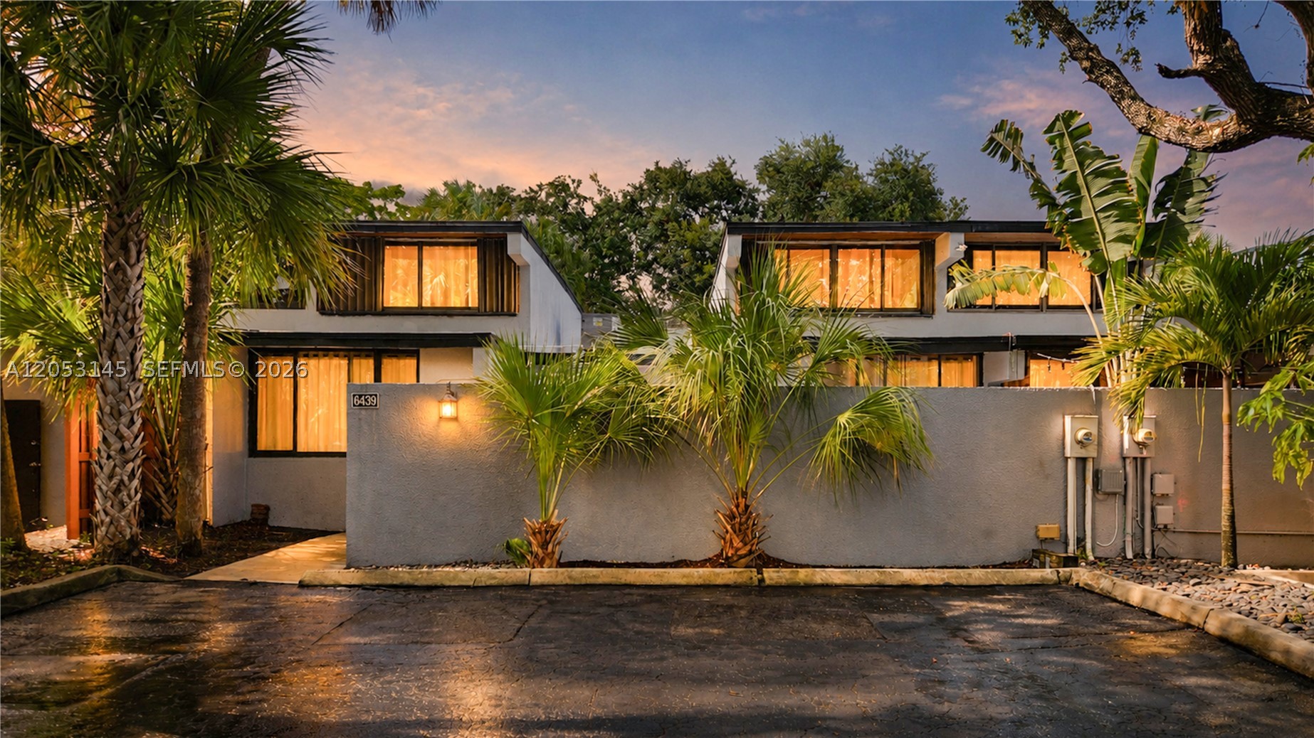 Architectural charm meets modern living in this one-of-a-kind 2-bedroom, 2-bath residence nestled in the heart of Miami Lakes. Designed with soaring cedar wood ceilings, dramatic staircases, and abundant natural light, this home offers a distinctive layout that stands apart from the ordinary.

The spacious open-concept floor plan seamlessly connects the living, dining, and kitchen areas while oversized sliding glass doors create effortless indoor-outdoor living around a private courtyard, perfect for entertaining or relaxing.

Both loft-style bedrooms feature warm wood flooring, vaulted ceilings, and generous space. The home also includes updated bathrooms, stainless steel appliances, an interior laundry area, and ample storage.

Enjoy the benefits of an exceptionally low HOA of just $85 per month and parking for up to three vehicles, a rare find in the area.

Conveniently located near parks, shopping, dining, top-rated schools, and major highways, this unique Miami Lakes home offers the perfect blend of character, comfort, and convenience.

Don't miss this rare opportunity to own one of the area's most architecturally distinctive homes.