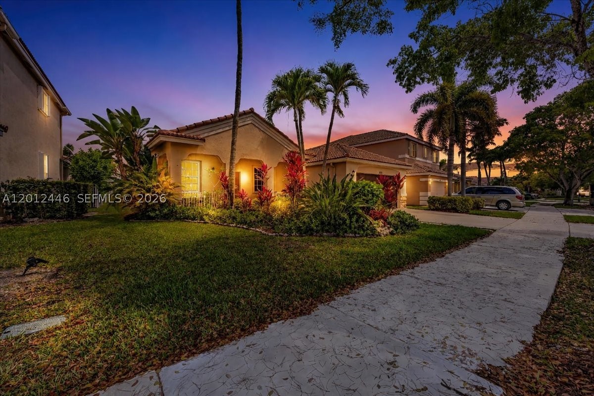 SELLER CREDIT TOWARD BUYER'S CLOSING COSTS. SPECTACULAR WATERFRONT POOL HOME IN THE HIGHLY SOUGHT-AFTER SAVANNA COMMUNITY! This beautifully maintained 4-BEDROOM, 2.5-BATH residence offers breathtaking lake views, a private pool, and an expanded screened patio—perfect for entertaining, relaxing, and enjoying stunning Florida sunsets. The spacious, light-filled floor plan features an upgraded kitchen, updated bathrooms, and inviting living spaces designed for comfortable everyday living. Enjoy significant energy savings with SOLAR PANELS INSTALLED IN 2024 (TRANSFERABLE LIFETIME WARRANTY) and a 220V ELECTRIC VEHICLE CHARGER in the garage. Additional features include HURRICANE-IMPACT WINDOWS ALONG THE REAR OF THE HOME and ACCORDION SHUTTERS THROUGHOUT for added protection and peace of mind. Experience RESORT-STYLE LIVING with Savanna's exceptional amenities, including a clubhouse, multiple pools, mini golf, pickleball courts, basketball courts, soccer fields, playgrounds, and more. ZONED TOP-RATED SCHOOLS: CYPRESS BAY HIGH SCHOOL, FALCON COVE MIDDLE SCHOOL, AND GATOR RUN ELEMENTARY SCHOOL. Ideally located near shopping, dining, major highways, airports, and South Florida's beautiful beaches. RARE OPPORTUNITY TO OWN A WATERFRONT POOL HOME IN WESTON AT AN EXCEPTIONAL VALUE!