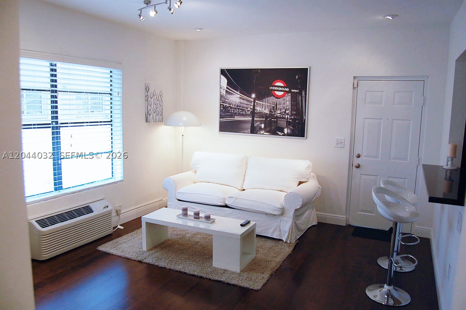 Great unit with new wood floors. For rent completely furnished with a queen bed in bedroom and queen sofa-bed in the living room. LCD high definition 50 inches tv. Great unit to live in. Don't miss it. Easy to show. The building is very well maintained and quite. Yearly only, no exceptions. First, last and security.