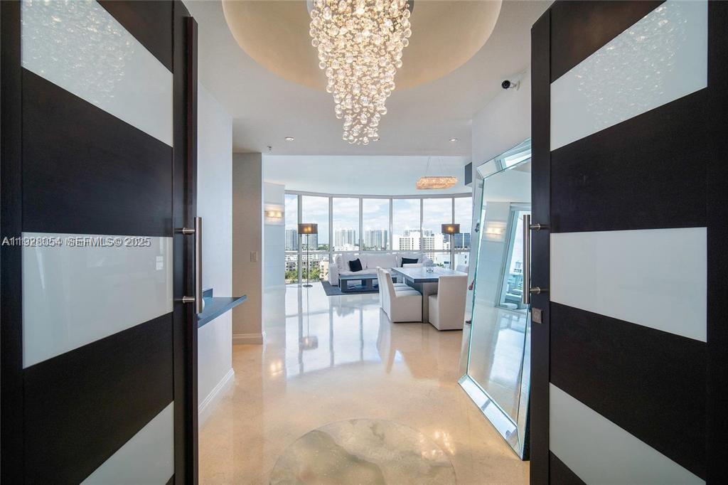 Stunning 3-bedroom, 3.5-bath residence located in the prestigious Trump Palace. This exquisite home features new modern finishes, marble floors throughout, a state-of-the-art gourmet kitchen, wet bar, elegant chandeliers and designer lighting, and custom built-out closets, offering both luxury and functionality.

Enjoy breathtaking panoramic views of the ocean, bay, and Intracoastal, making this residence a true sanctuary in the heart of Sunny Isles Beach.

The building offers world-class amenities, including on-site restaurants, four resort-style pools, a fully equipped fitness center, business center, and much more.

? An exceptional opportunity to own a magnificent home in one of Sunny Isles Beach’s most desirable luxury buildings.