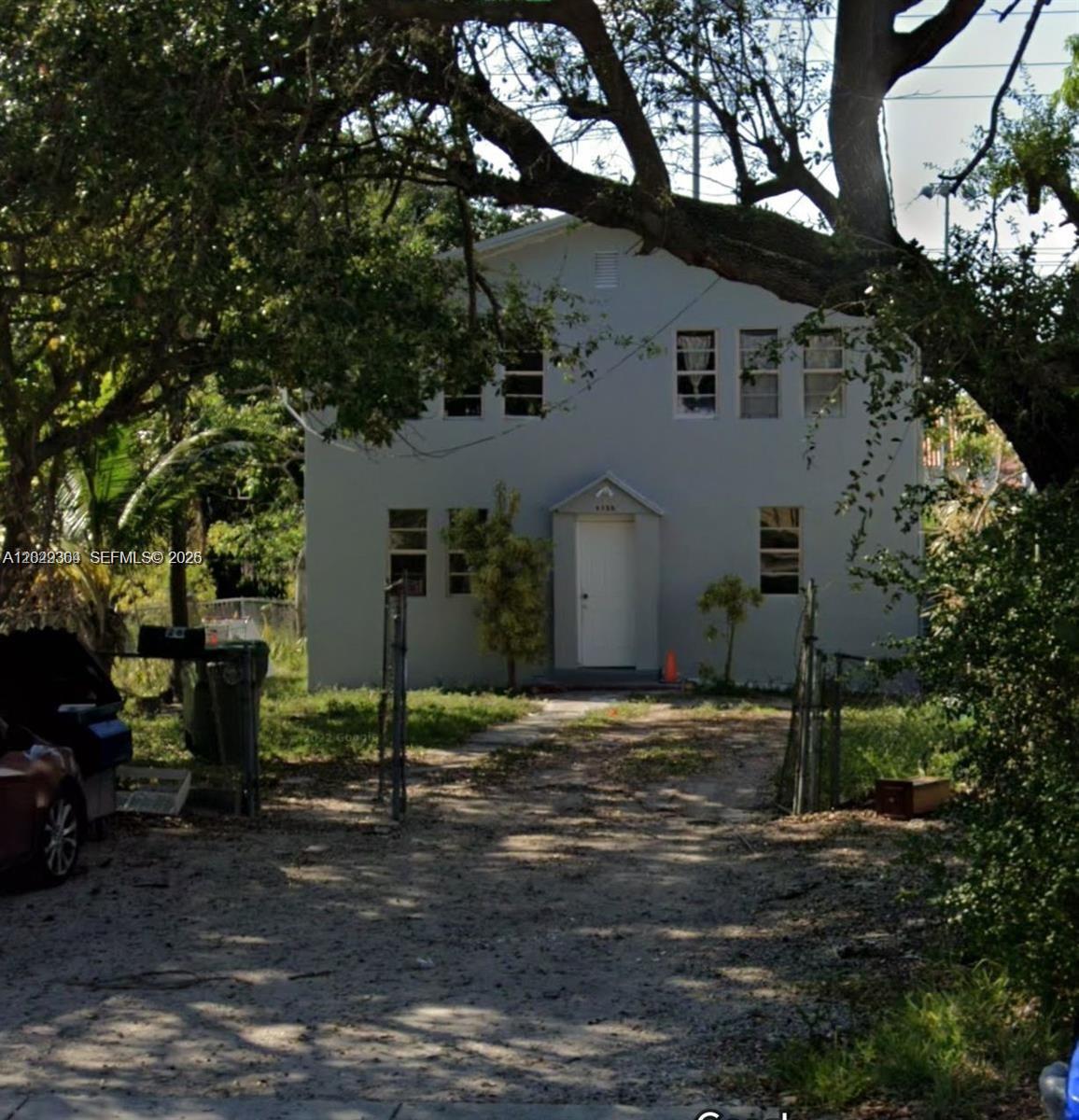Charming 2-bedroom, 1-bathroom home located at 6326 NW 4th, Miami. This freshly updated property features modern gray walls, stylish dark wood laminate flooring throughout, and ample natural light from large windows. The spacious living area is perfect for relaxation or entertaining, while the well-appointed kitchen includes a refrigerator, stove, and sink with white cabinetry. The bathroom offers a clean design with a tub, shower, and sink. The neighborhood is conveniently close to several parks, providing easy access to outdoor recreation and green spaces. Available now!