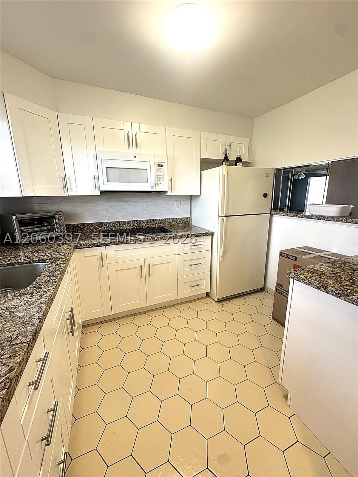 Welcome to your bright 1 bedroom and 1/ 3rd floor in Sunrise Lakes 55+ Community! Inside, you'll find a well-maintained interior that features a lovely Florida room that expands your living space & makes everything feel even more open. With no neighbors above, you'll enjoy extra peace & quiet along with plenty of natural light streaming in from additional end-unit windows. You’ll also love the serene lake view that adds a touch of nature to your daily life & the convenience of an in-unit washer & dryer. Unit comes with one dedicated parking space plus ample guest parking. Water, sewer, internet, pest control & much more included! New roof 2025! This is a rare find that combines comfort, natural light, and a great location. Come see it for yourself!