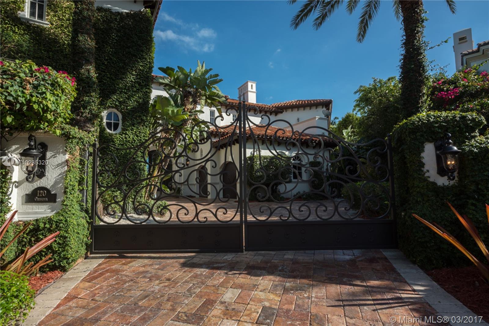 Exquisite Private Waterfront Residence, Enclosed  Breezeway Entry, High Coffered ceilings, gorgeous Millwork, Summer kitchen,wine storage  for 750 bottles,  Gym, Gourmet Kitchen, Pantry, 5 bedrooms,  4 Baths on 2nd Floor,  balconies,  Elevator.  6th Bedroom Suite on first floor, now used as Office. Expansive Private Master with Sitting Area, luxurious bath, extra large closets. Terraces overlooking Pool and water views. A truly beautiful home. 2005 Winner,  Best Custom Home Platinum Award. 15,428 Ft Lot.