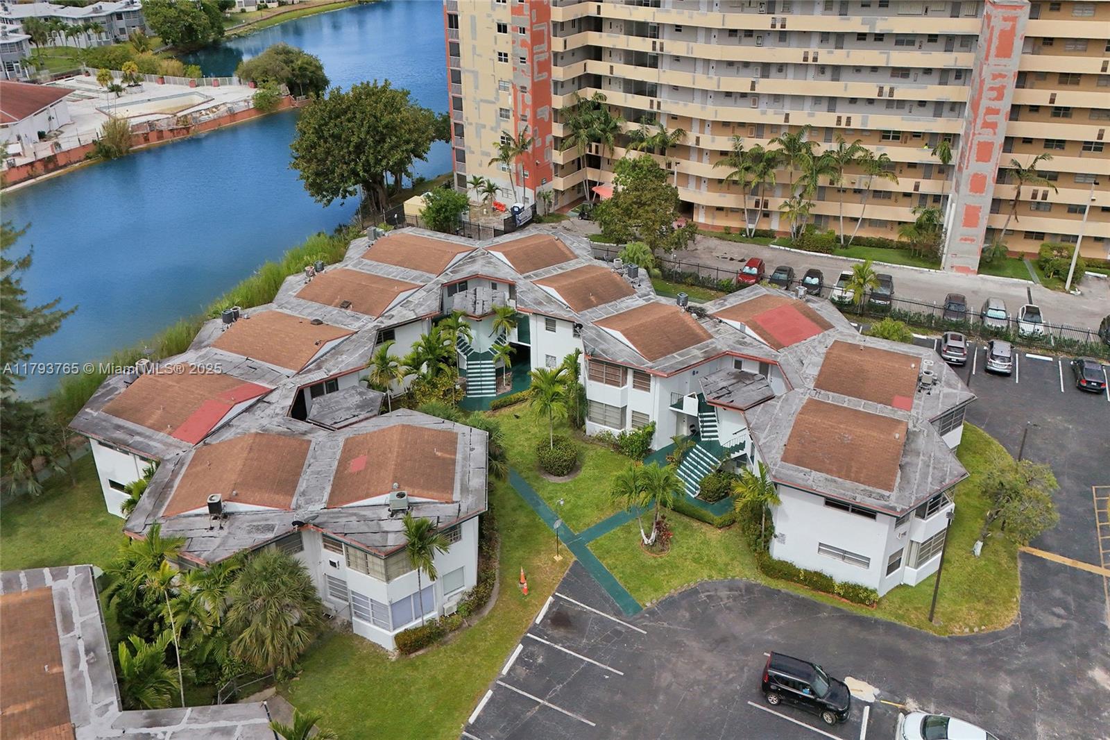 Spacious modern 2bed/1bath condo on the first floor. Ceramic flooring throughout the unit. Enjoy the beautiful lake view from enclosed porch or get a private access view from your own personal back door that opens up to the lake. Centrally located near all best shopping Aventura has to offer.