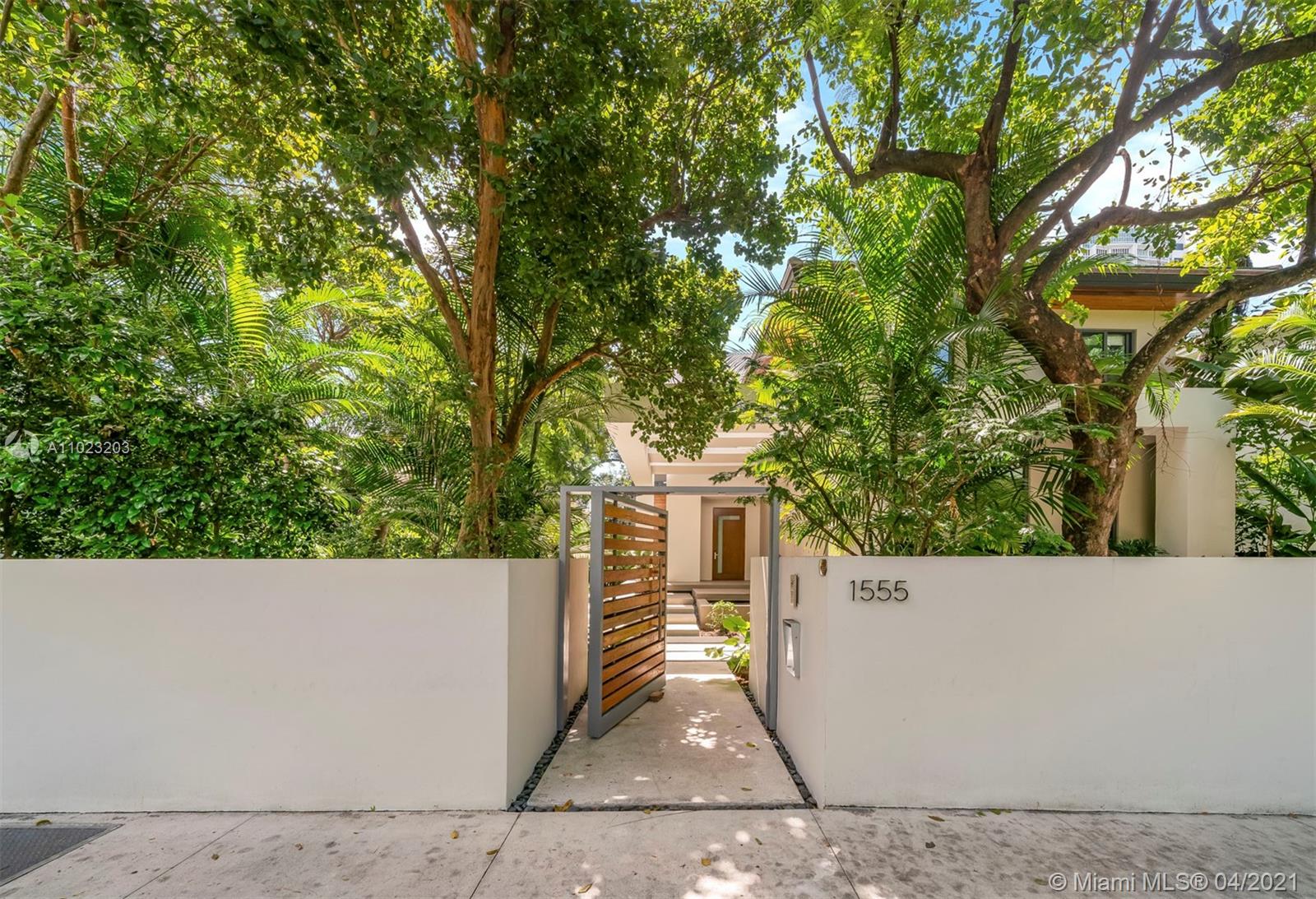 Spectacular 3-story residence surrounded by tall leafy trees and lush landscaping. Envisioned to meld with its surroundings and maximize views, this 8,736 Sq. Ft. home features light-filled interiors that are a work of art, with floor-to-ceiling windows. The formal living and dining room and chef’s kitchen connect seamlessly to create a comfortable and stylish living experience. The terrace is ideal for entertaining, with a summer kitchen and views of the beautiful swimming pool. On the third floor, you find a media room, 3 loft-style bedrooms with ensuite baths, and the main suite with a seating area, balcony, spacious walk-in closet and spa-style bath.  Complete with an elevator, gym, 2-car garage and additional parking space, the home offers privacy and an unmatched living experience.