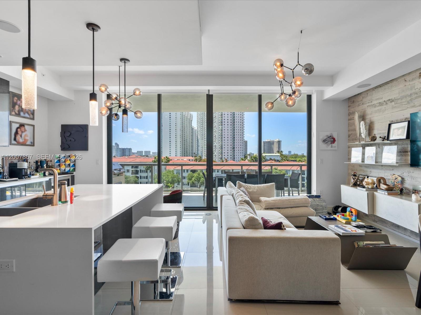 Magnificent direct ocean, Intracoastal, and city views at Echo Aventura. This exceptional 3-bedroom + maid’s room residence, with 4 full bathrooms and 1 half bath, offers 2,237 SF of luxurious interior living space plus expansive terraces in the iconic Carlos Ott–designed building. Featuring a private elevator entry, dramatic floor-to-ceiling high-impact glass, smart home technology, automated window treatments, and a gourmet kitchen with top-of-the-line appliances, this turnkey residence is offered fully furnished.
Step onto the oversized terraces, complete with a built-in BBQ, and enjoy breathtaking panoramic views spanning the Atlantic Ocean, Intracoastal Waterway, and Miami skyline—perfect for entertaining or relaxing in total privacy and style.

Echo Aventura provides a true resort-style lifestyle with world-class amenities, including a bayfront infinity-edge pool, a 4,000 SF state-of-the-art fitness center with a yoga studio, an elegant event lounge, 24/7 concierge services, valet parking, and a gated, guarded entrance.

Ideally located in the heart of Aventura, this rare offering combines sophisticated design, unmatched views, and an elevated lifestyle experience. A must-see property.