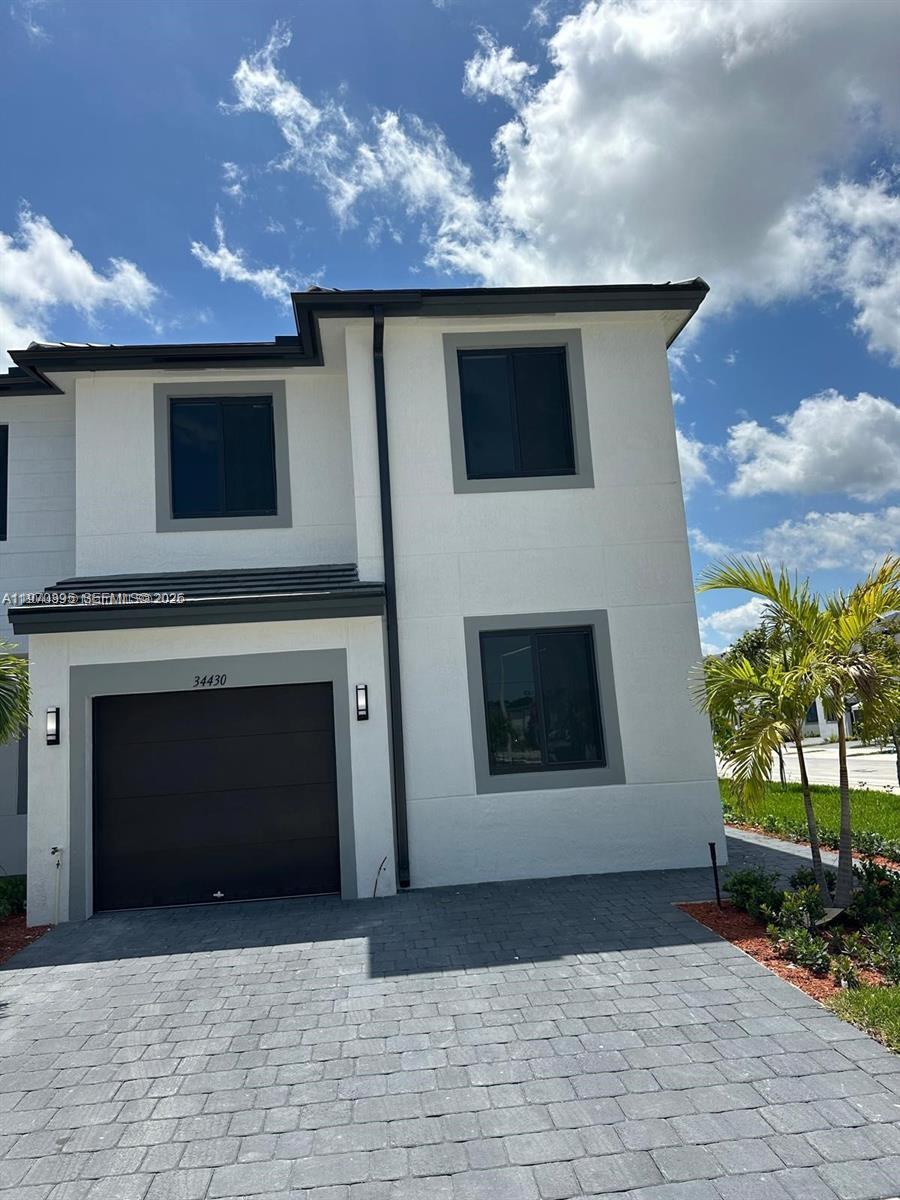 Welcome to your dream home in the" CENTURY PARK community in Florida City" This brand-new, move-in-ready property and offers the ideal blend of style, comfort, and convenience. Featuring 4 spacious bedrooms and 3 full bathrooms, this home is thoughtfully  for modern living. The open-concept layout includes ceramic tile flooring throughout the first floor,and laminate flooring on the second floor, offering both elegance and comfort. Enjoy peace of mind and energy efficiency with impact windows throughout. private backyard, perfect for entertaining or relaxing in your own outdoor Situated on a premium corner lot, with curb appeal.
