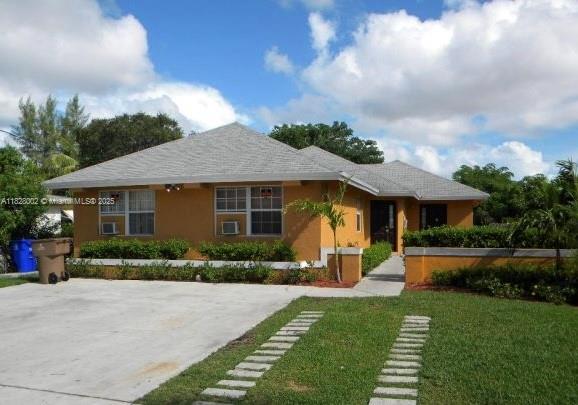 Opportunity Awaits in East Deerfield Beach! This spacious 3-bedroom, 2-bath home offers over 1,800 sq ft of living space and is nestled on a generous 6,499 sq ft lot with garden views. Built in 2002 with solid concrete block construction, this property provides a strong foundation for your personal touch. Whether you're a first-time homebuyer ready to build equity or an investor looking for your next project, this home offers room to grow and potential to shine. No HOA, close to beaches, highways, and local shops. Sold as-is bring your imagination and make it yours!