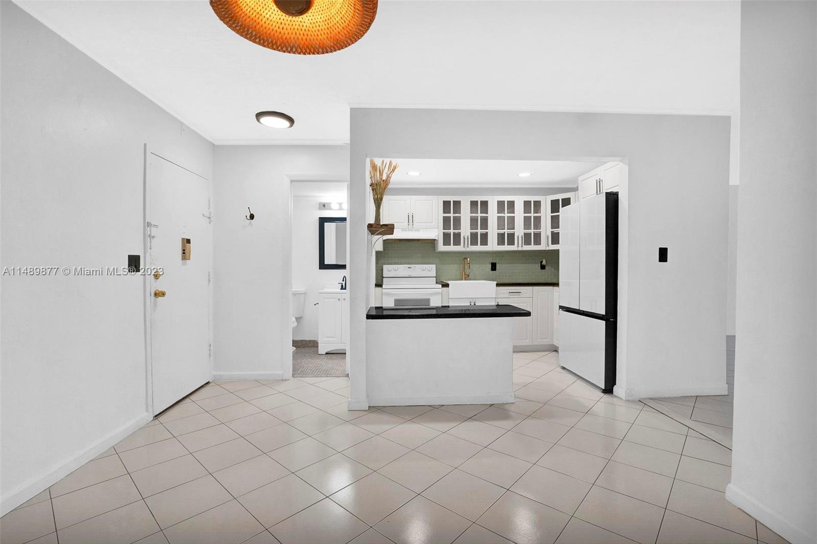 A home for the holidays! This 1-bed, 1.5-bath condo boasts a spacious layout, a private patio, and modern upgrades like kitchen recessed lighting and a new Samsung refrigerator. Recently remodeled bathrooms feature upgraded vanities and fixtures. Enjoy separate dining and living areas, an open kitchen, and a roomy bedroom with a large walk-in closet. Conveniently located near shops, restaurants, and entertainment, with easy access to the Turnpike and major highways. Security is ensured with a keyed lobby entrance, and on-site laundry adds to the convenience. The community, suitable for all ages, offers amenities like a gym, pool, and tennis courts. All offers will be reviewed on Tuesday, 11/28/23. Make this charming condo your home for the holidays!