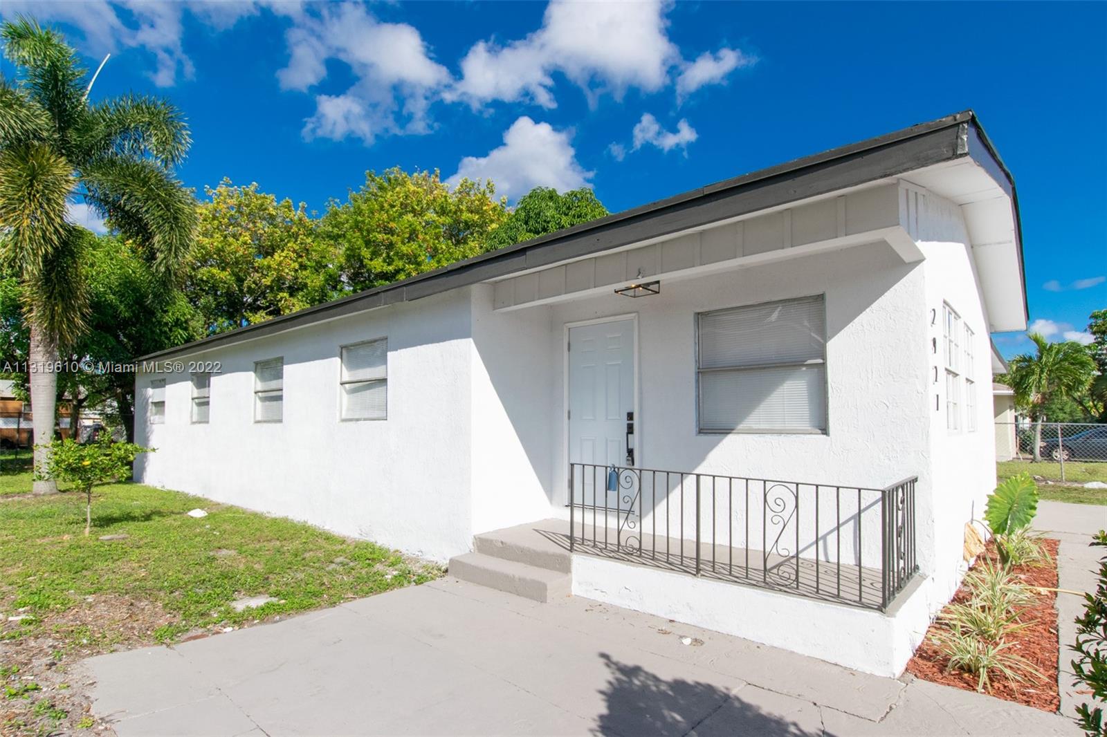 Beautifully renovated 4 bedroom, 2 full baths single family home, with bonus room in front. Centrally located, great layout..  Features include new custom modern kitchen with stainless steel appliances, updated baths, new laminated wood flooring throughout with new modern baseboards, repainted interior/exterior, new interior/exterior doors, new light fixtures. Great property, come see it today!