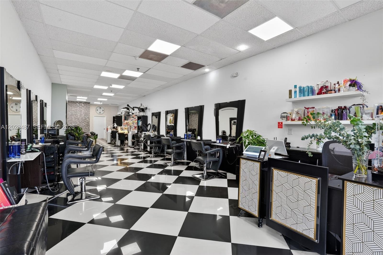 Turnkey beauty salon opportunity in the heart of Kendall! Established in 2011 with a loyal clientele and excellent 4.7-star Google rating from over 140 reviews. Approx. 1,080 SQFT featuring elegant black & white flooring, 7 hairstylist stations, 2 shampoo stations, 4 pedicure spa chairs, 4 manicure stations, 1 private suite, reception/waiting area, security cameras, washer/dryer, and 2 working A/C units. Located in a busy Publix-anchored shopping plaza with ample parking. Fully operational and permitted. We would be delighted to assist you with additional information and a confidential showing. Call today!