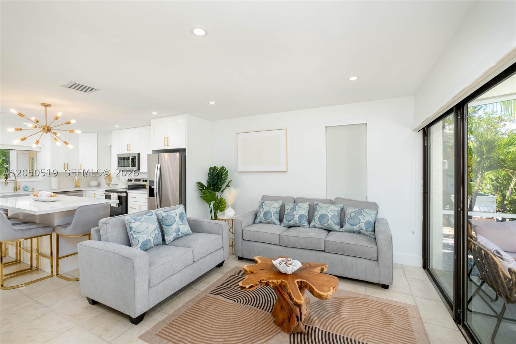 COMPLETELY RENOVATED CORNER 2-bedroom, 2-bath townhome in the highly desirable Kawama Yacht Club. Sold fully furnished, and includes two kayaks, making it a perfect turnkey vacation home or income-producing short-term rental. HOA includes also water, cable and internet. The unit comes with impact windows and new tankless waterheater. Gated community with 24-hour security, two pools, a private marina, first-come, first-served boat storage, boat ramp, fire pits, waterfront BBQ areas, and ample parking. Move-in ready—just bring your boat and enjoy the relaxed Florida Keys lifestyle.