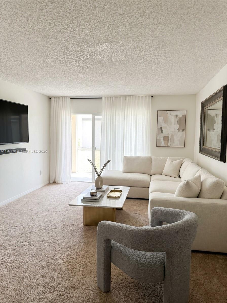 Nice 2 bed/2 bath in gated community with clubhouse, gym and swimming pool. Open kitchen, balcony, washer and dryer included. Great location in Hollywood. Some photos are virtually staged.