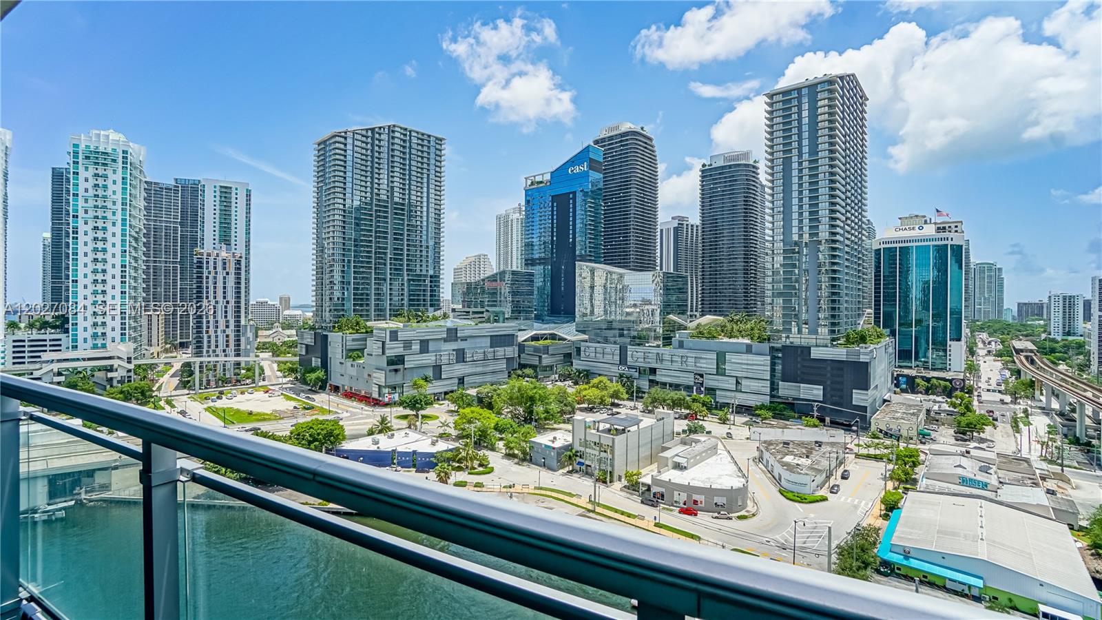 Experience refined waterfront living in this spacious upgraded residence featuring direct Miami River views and stunning panoramas of the Brickell skyline and Brickell City Centre through floor-to-ceiling glass. This thoughtfully updated unit includes a converted 3rd bedroom (enclosed den with closet), abundant closet space throughout, and one of the most conveniently located low-floor parking spaces in the building. Located in the gated Riverfront community, Mint offers a vibrant yet serene lifestyle in the heart of Miami, just moments from Brickell’s financial district, Brickell City Centre, Mary Brickell Village, Downtown Miami, world-class dining, shopping, and entertainment, with easy access to I-95. Residents enjoy resort-style amenities including a state-of-the-art fitness center, spa with steam rooms and Jacuzzi, resort-style pool, business center, library, children’s playground, concierge services, and 24-hour front desk/security. Contemporary design, upscale finishes, and an unbeatable central location make this an exceptional opportunity in one of Brickell’s most desirable waterfront communities.