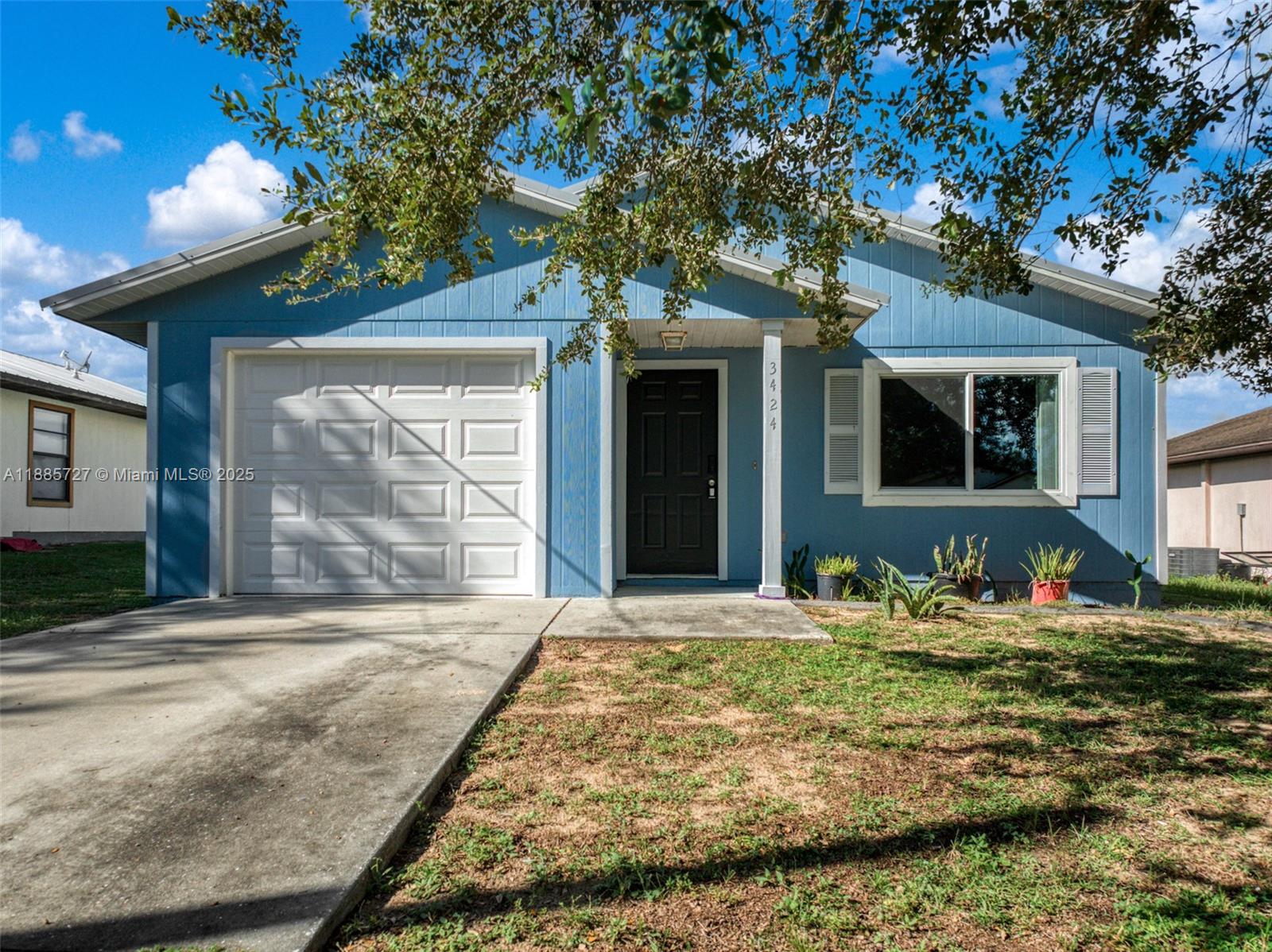 Discover this charming and affordable 3BR/2BA home with 1-car garage in the heart of Sebring! Built with durable Hardi Board siding and upgraded for efficiency—featuring a new metal roof, PGT impact windows, Carrier ultra-high-efficiency heat pump, and impact-rated insulated garage door. Utility costs average only $130/month, even with EV charging! Inside, enjoy a bright open layout, private primary suite with walk-in closet, new tile flooring, and fresh paint. Includes 50A 240V outlet for EVs or tools, smart home features, and a covered porch for outdoor living. No restrictions—perfect for gardening, chickens, or hobbies!