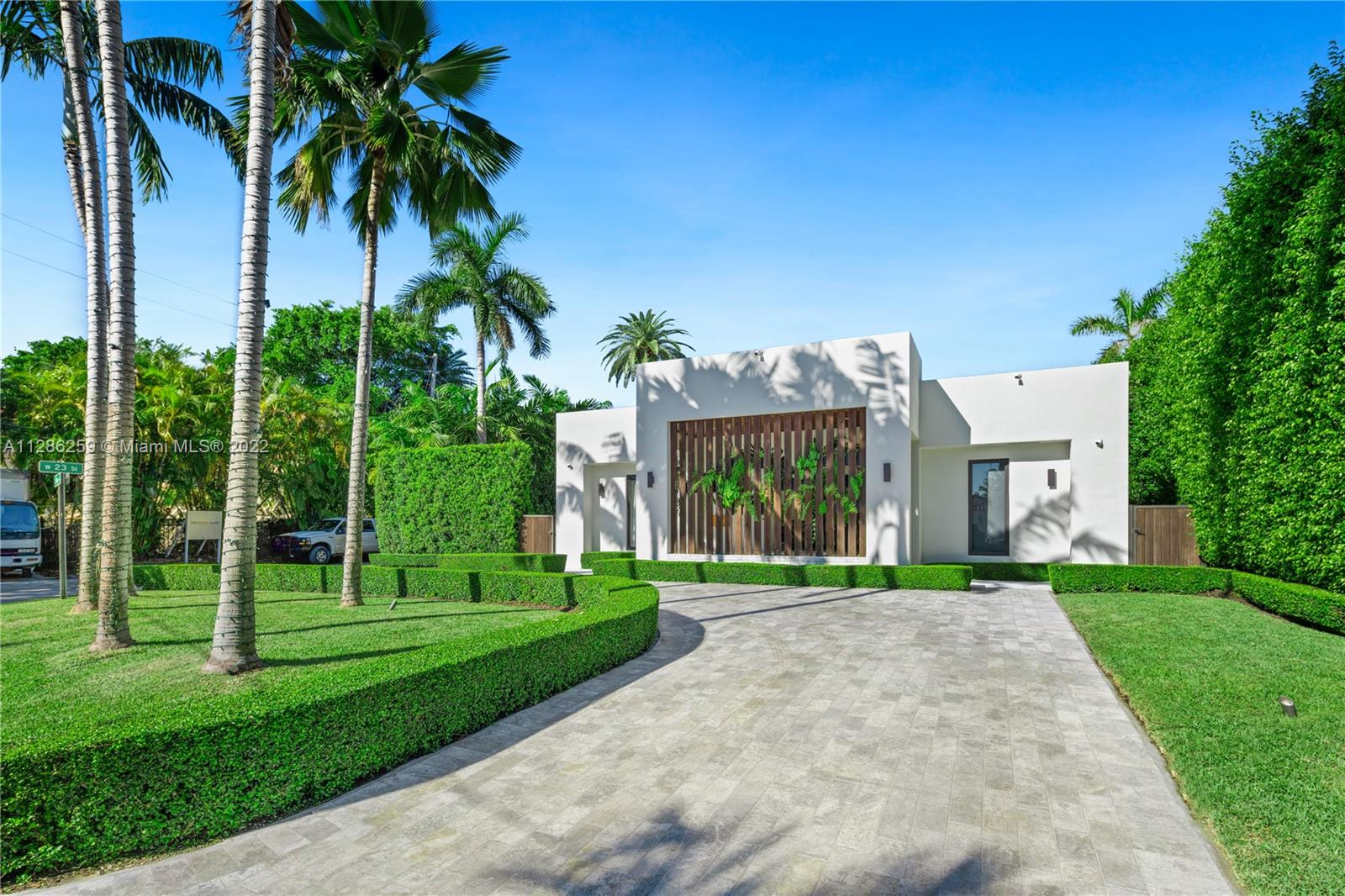 This resort-style residence is located in the most exclusive, private community in Miami Beach, Sunset Islands. The home was completely renovated and upgraded to a smart home. The Arclinea kitchen features a subzero fridge, Gaggenau appliances, a stainless steel bar and wine fridge. Glass doors wrap around the exterior, and offer views of the salt water pool, green lawns and expansive wood decks. Grecian Thassos marble floors keep the home especially cool in the summer sun. Bedrooms feature Listone Giordano wood floors and custom LEMA closets. On a beautiful corner lot, 2300 Lake Avenue is close proximity to Sunset Harbour’s incredible assemblage of shopping & dining. With exceptional sunsets, incredible island living, and an exclusive location beyond compare this is an absolute must see.