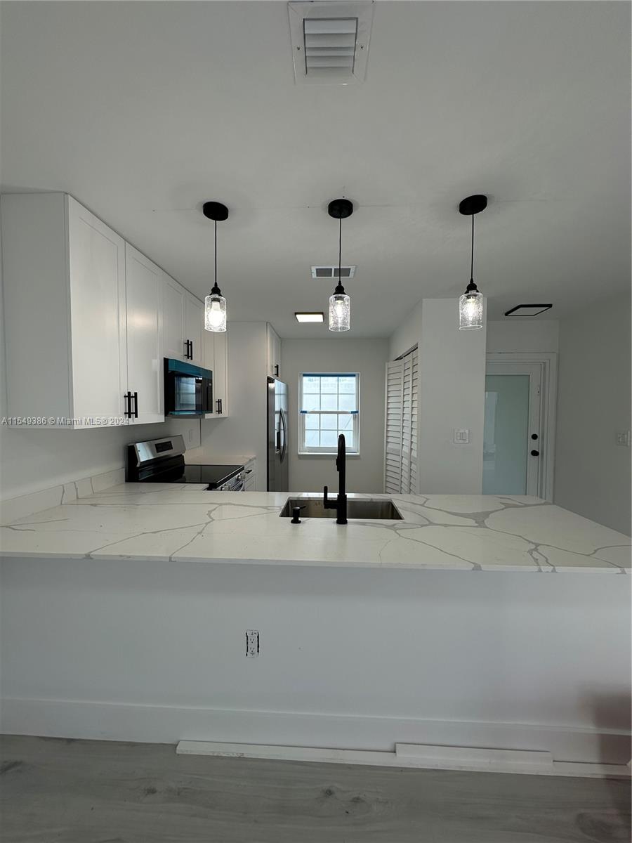 Don't miss this incredible opportunity to own a beautifully RENOVATED Single Family Home in Kendall, offering the BEST PRICE and condition in the area! This 3-bedroom, 2.5-bathroom home is ideal for any buyer looking to purchase in this market, featuring charming finishes and renovations that will delight you. THE ROOF is around 4 years old, ensure worry-free living. Take advantage of this great opportunity and make this house your new home! PRICED TO SELL FAST!