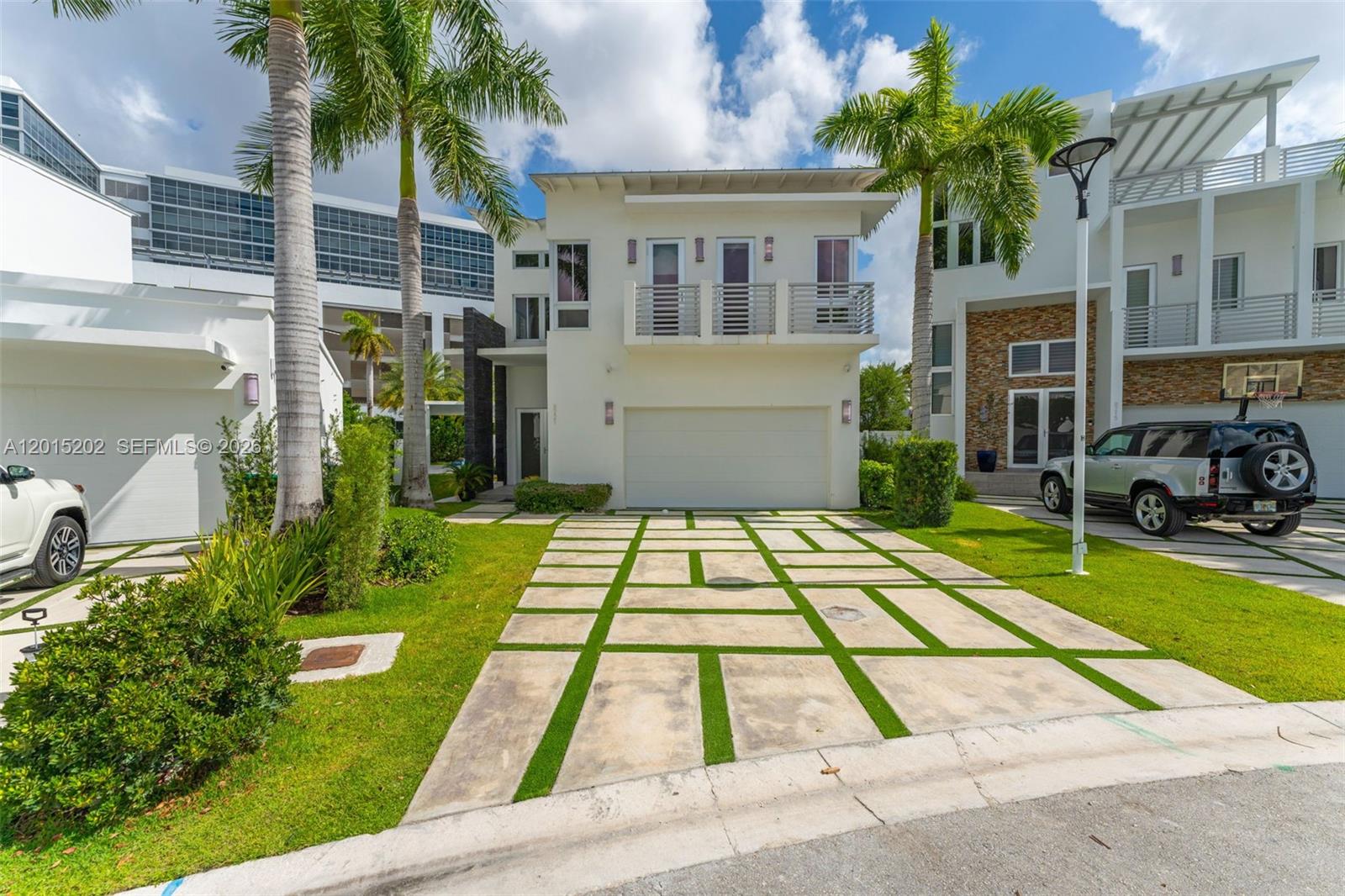 Beautiful luxury corner-lot residence located within the prestigious gated community of Oasis Park in Doral, Florida. This modern-designed home features 4 bedrooms and 4.5 bathrooms, offering an exceptional blend of elegance and comfort. The property is equipped with marble flooring throughout, stainless steel appliances, a custom wine cellar, a two-car garage, a stunning outdoor pool, and a fully equipped summer kitchen designed for entertaining and everyday enjoyment. Conveniently situated near Downtown Doral, premier shopping and dining destinations, top-rated schools, and with easy access to major highways and Miami International Airport.