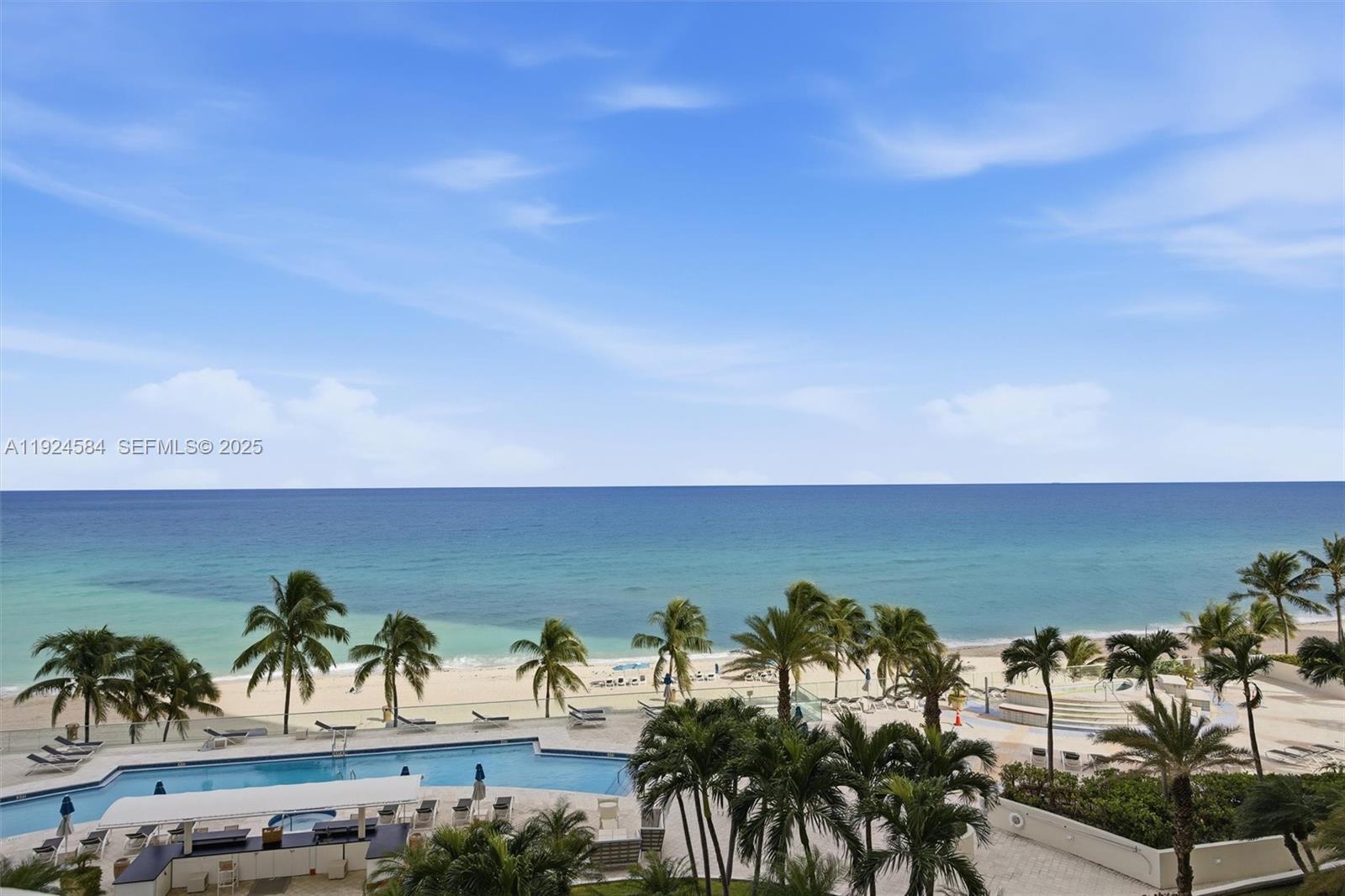 Stunning direct ocean views from the oversized terrace from this beautiful large 3 bedrooms and 4 and half bathrooms  flow-trough apartment offering 2440 sq ft of living space and over 600 sq ft of terraces. Feels like an oceanfront paradise home with ocean front yard. Second oversized terrace has gorgeous, garden , City and bay views. Newer 2 A/C units, new Subzero and Viking appliances. Marble floors thought. Private elevator, Laundry room, 2 assigned parking spaces and 1 storage. Building offers amazing resort style amenities, 2 tennis courts, ocean view gym, beach front and pool side service, on site restaurant, massage room, game room, kid's play room, social room, pet area & valet service. Great schools. Must see!!!!!