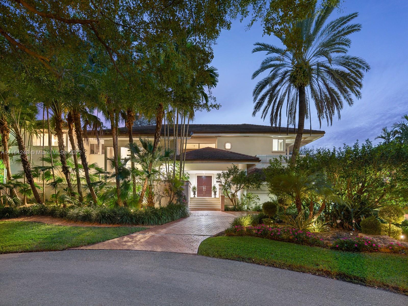 Incredible opportunity amidst record-breaking low inventory in the esteemed waterfront gated community of Islands of Cocoplum in Coral Gables. This two-story 5,500 SF home is located in an excellent location within the neighborhood off the first roundabout on a beautiful and quiet cul-de-sac. It is situated on a spacious corner lot of almost 21,000 SF with lush landscaping including mature oaks and fruit trees; the side street, Tulipan Court, is also a cul-de-sac. The rooms are generous in size consisting of five en suite bedrooms, six full bathrooms including an oversized cabana, and a powder room. The downstairs has two split bedrooms, and the upstairs has three bedrooms including a marvelous two-level master suite with multiple closets.