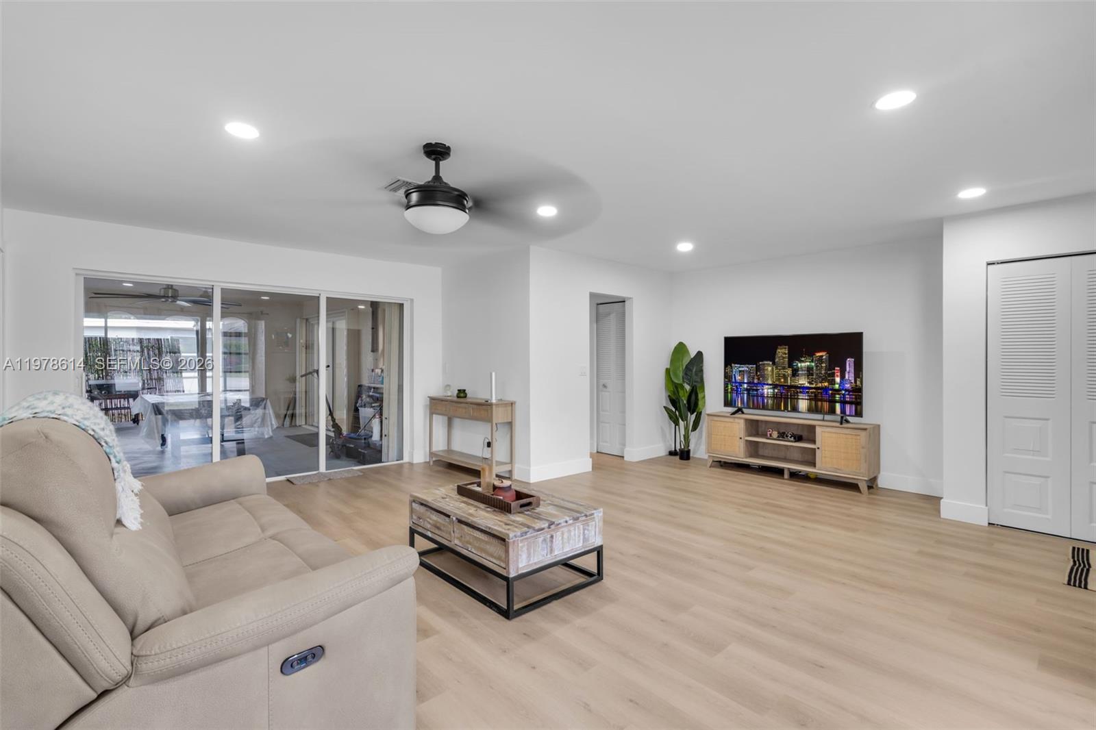 Welcome this move-in-ready 2-bedroom, 2-bath Deerfield Beach home. Major upgrades including a new roof (2021), AC (2020), updated water heater, and beautifully updated bathrooms and luxury vinyl flooring/baseboards (2025). Features include a pass-through kitchen with soft-close cabinetry, sliding doors to an extended screened-in patio, hurricane shutters, and a one-car garage. Enjoy community amenities including a clubhouse, pool, gym, sauna, recreation area, and hot tub. Conveniently located near major highways, shopping, dining, and the beach. Schedule your showing today!