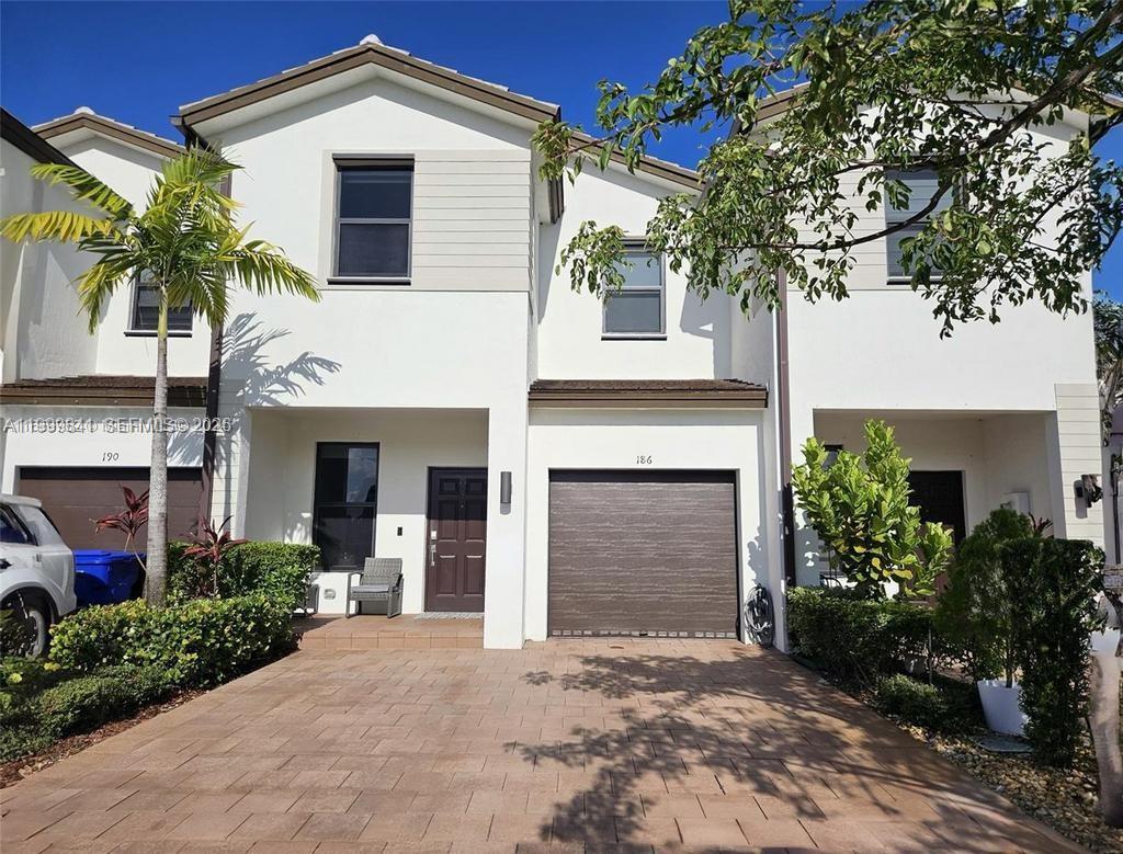 Seize this unique opportunity to live in this beautiful and spacious 3-bedroom, 2.5-bathroom townhouse featuring a one-car garage. It boasts an open-concept design. This family-friendly gated community offers a swimming pool and social area, and is centrally located in an area featuring top-rated schools, shops, restaurants, and entertainment options. THE PROPERTY IS RENTED UNTIL DECEMBER 9, 2026, FOR $3,200 PER MONTH (the property can also be delivered vacant at closing if the new owner so desires). 24 HOURS' NOTICE IS REQUIRED TO SCHEDULE SHOWINGS.