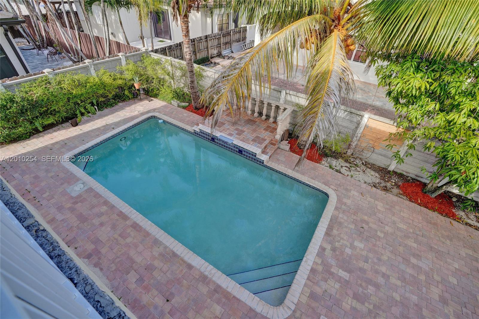 Just Listed! Stunning 4BR/3BA two-story single-family home with private in-law suite featuring direct pool access—ideal for rental income, Airbnb, or guest quarters (suite can be sold furnished, optional)—open-concept floor plan, soaring ceilings, large balcony overlooking a private pool, 2-car garage plus extended driveway parking, located in a high-demand no-HOA community in an incorporated area, walkable to top-rated schools and minutes to major highways, shopping centers, restaurants, and daily conveniences—great investment opportunity, easy to show, motivated sellers!