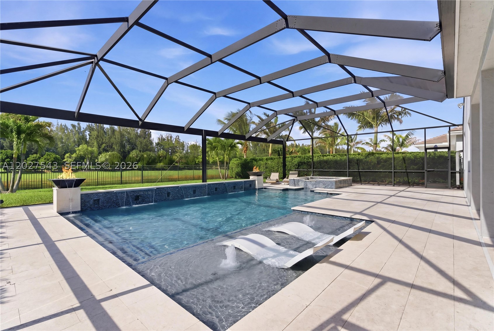 One of Westlake’s premier waterfront homes—an extensively upgraded Kestrel Grand model offering 5 bedrooms, 4.5 baths, and over 4,110 square feet on a rare oversized lakefront lot. Designed for elevated indoor-outdoor living, the home features soaring ceilings, premium flooring throughout with no carpet, custom fireplace, built-in speakers, designer lighting, California Closets, Monogram appliances, double ovens, gas cooktop, oversized quartz island, and a newly installed reverse osmosis water filtration system. The resort-style backyard includes a heated screened-in pool and spa, fire features, outdoor kitchen/bar, expansive fenced yard, privacy hedges, and tranquil lake views. Located in one of Westlake’s most desirable waterfront settings.