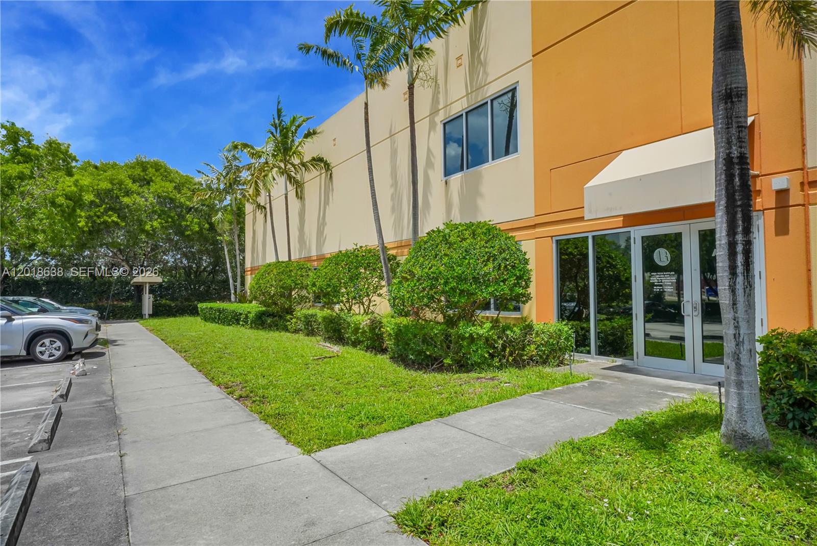 Exceptional opportunity to acquire a premium industrial office/warehouse condominium in the highly desirable First Industrial Commerce Center in Medley, FL. Unit A-114 offers ±11,418 SF total, including a warehouse space and an office/showroom area. Built in 2007, the property features approximately 7 offices, conference room, reception area, showroom, kitchenette, mezzanine, and 3 restrooms.

Warehouse features include 20’-22’ clear ceiling heights, 1 dock-high loading door, 1 concrete rear ramp, rear-loaded access, gated truck court, and excellent truck circulation. The unit includes 14 assigned parking spaces plus additional visitor parking.

Property highlights include hurricane impact-resistant glass, reinforced concrete tilt-wall construction, 3-phase heavy power (200 Amps | 120/480 Volts | 4-wire service), emergency lighting, exterior signage availability, and secure gated access.

Strategically located with immediate access to Florida’s Turnpike and close proximity to SR-826, Okeechobee Road, and I-75, providing excellent connectivity throughout Miami-Dade and Broward County.

Zoned M-1 Light Manufacturing Industrial/Commercial District, allowing a variety of uses including logistics, warehousing, distribution, import/export, light manufacturing, and showroom/office operations.