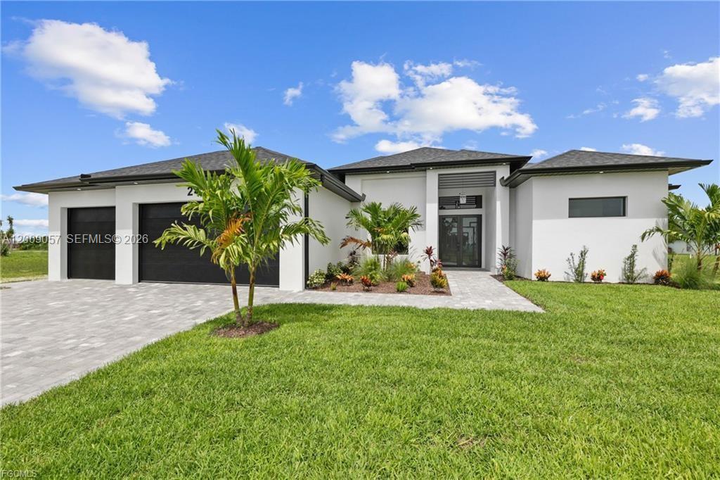 Attention!! Don't miss this opportunity to live in this beautiful, newly built home located in the highly desired area of Cape Coral, less than 5 minutes from Publix, Walmart, a gas station, Target, and a shopping center. This amazing property has 4 bedrooms, 3 bathrooms, 3-car garage, high ceilings with 1931 s/f, impact windows, 8-foot-high interior doors, indoor and outdoor kitchen, outdoor pool, and a beautiful screened, modern appliances throughout the house, ceramic floors with unmatched comfort in an open floor plan!