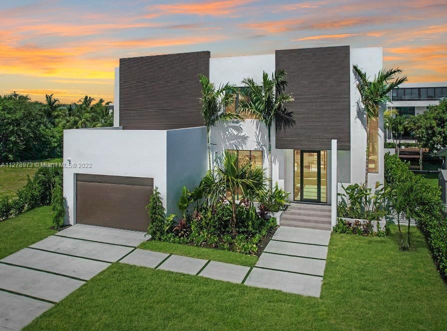 Just finished! Move in Immediately. NEW Modern 2 Story Waterfront Pool Home w/Ocean access, No bridges to Bay. 5 bed & 5 Baths (5th room set us as den/office/upstairs sitting area) on quiet cul-de-sac street. 1st and 2nd floors are solid concrete. Features: New synthetic Dock with 75 ft on the water, Quick ocean access! Water views from many rooms. Open floor plan with soaring high ceilings, impact/Hurricane rated glass and 10ft floor to ceiling glass, natural gas, and 2 car garage. Primary bedroom features huge balcony overlooking the pool and water. All closets built out! New Heated pool with inlayed waterfall Jacuzzi. Located in 24 hr guard gated Islands of Keystone Point, Miami, Florida.