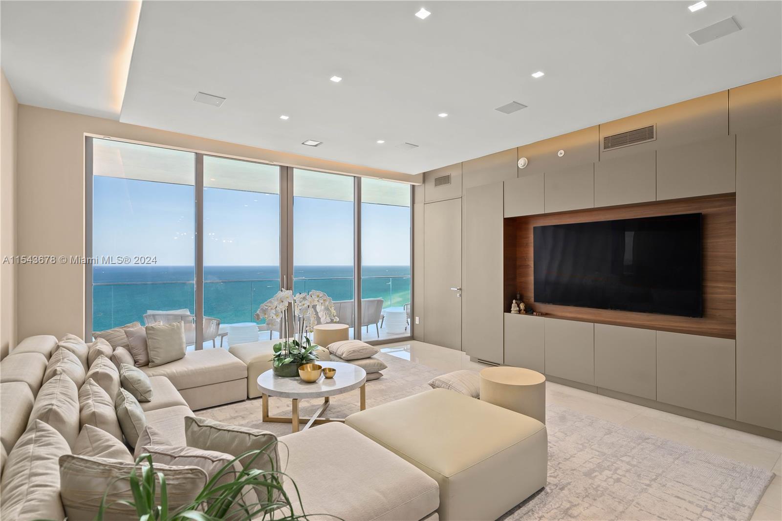 Experience luxury living at Residences by Armani Casa, created by the renowned architect Cesar Pelli & Giorgio Armani. This STUNNING 3-bedroom, 3.5-bathroom unit is the most sought-after line at the 5-star Armani, offering unobstructed ocean & city bay views. This unit features high-end luxury finishes, a top-of-the-line kitchen w/ Wolf appliances, a Sub-Zero refrigerator, & a wine cooler. It is Professionally Decorated & Furnished, providing the ultimate in luxury living. The unit is fully finished and provides access to resort-style amenities such as a two-story full-service spa, private restaurant with room service, game room, cigar/wine room, gym, ocean-view yoga studio with Pilates, movie theater, child's playroom, concierge, and 24-hour valet services.