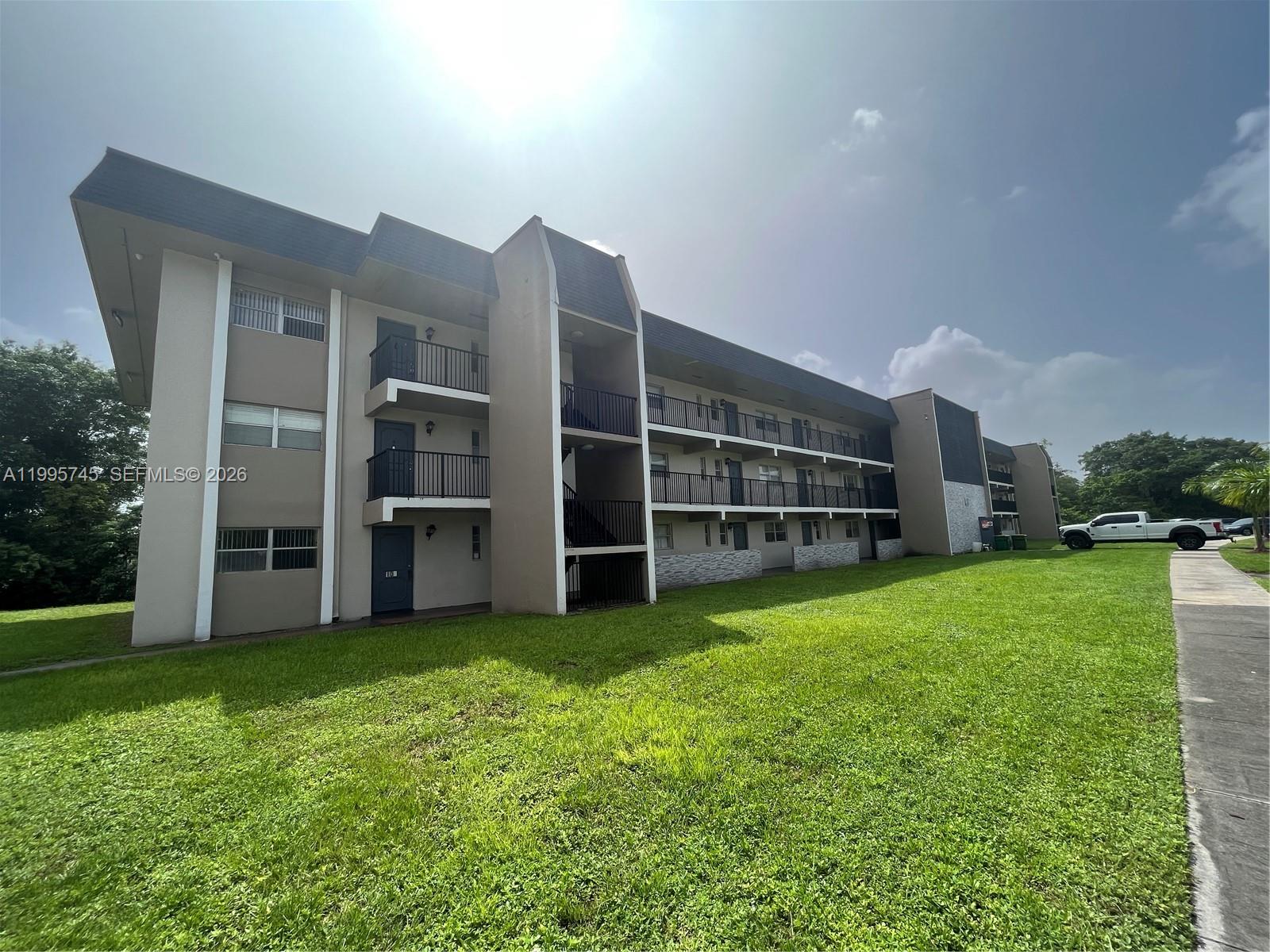 Spacious and semi-updated 2/2 condo on the 3rd floor of a well-maintained building in a highly desirable gated community in Tamarac. With new laminate flooring throughout, updated cabinet doors in the kitchen and bathrooms (installed last year), generously sized bedrooms with walk-in closets, and screened balcony with tree views. Amenities include: laundry rooms on each floor, pools, clubhouse, tennis courts, gym, bbq area. Conveniently located near shopping, dining, schools, and major roads and highways. Water included in HOA and NO rental restrictions. $54/monthly special assessment until Dec 2028. Excellent investment opportunity. TENANT PAYING $1,750 MONTHLY UNTIL JUNE 2027.