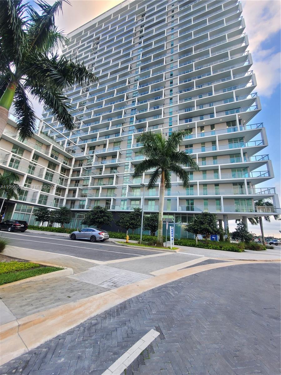 Exclusive apartment in Metropica-Sunrise. This one bedroom open-concept floor plan connects the kitchen, living, and dining areas to a spacious balcony on the 4th floor, offering a magnificent view. The one-bedroom unit features a comfortable kitchen with contemporary, high-end finishes and porcelain flooring. Impact windows and blackout blinds are included. Enjoy custom finishes throughout, high ceilings, and abundant natural light. Large washer and dryer. **High-speed internet, cable, and water are included in the HOA payment**. Enjoy the amenities: fitness center, pool, tennis court, and ample social areas and the great location just steps from Sawgrass Mills Mall, shops and restaurants.