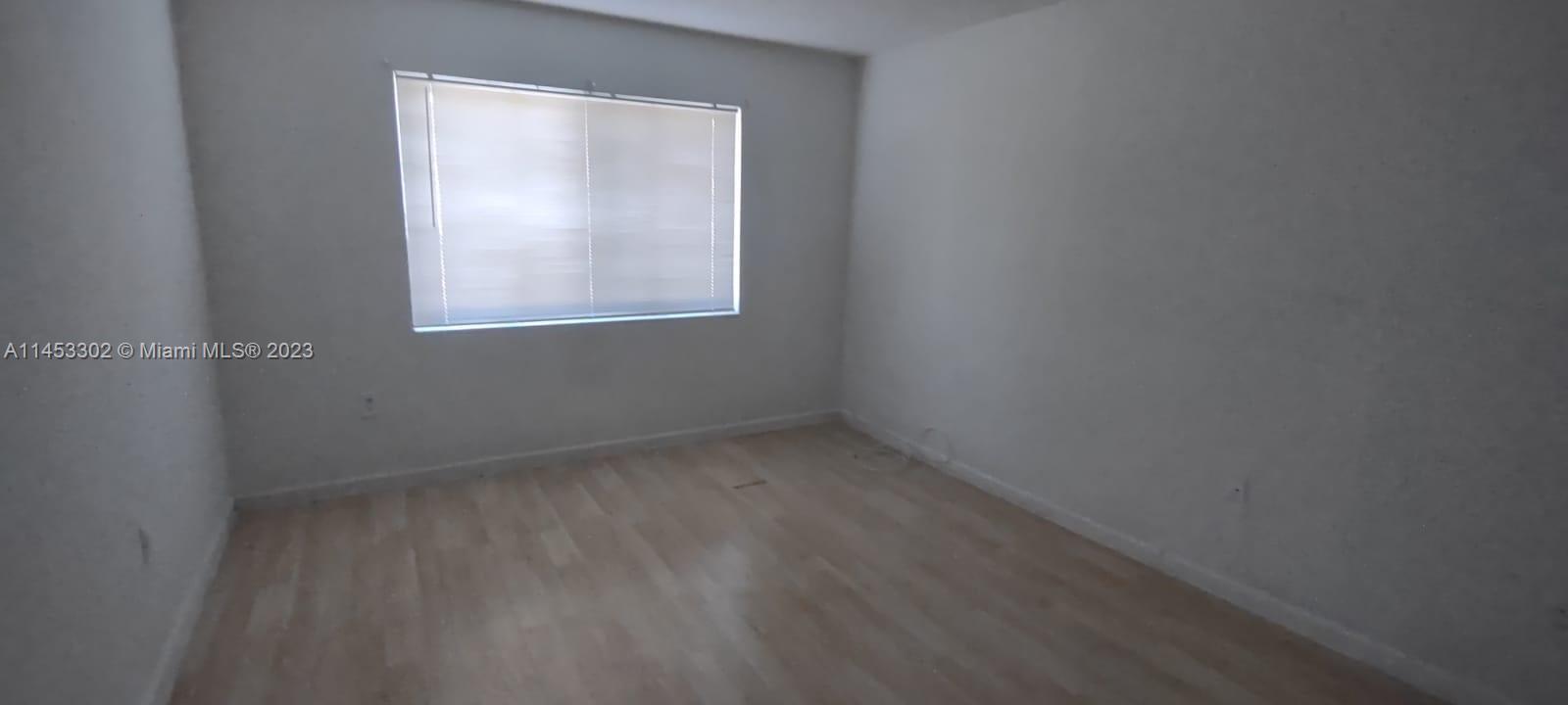 NEW WORLD CONDO APTS IV - Residential Lease