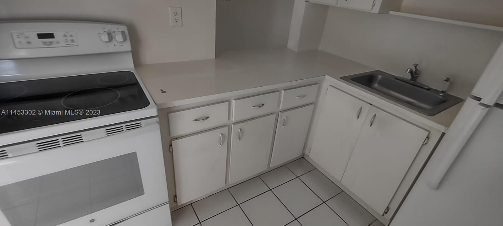 NEW WORLD CONDO APTS IV - Residential Lease