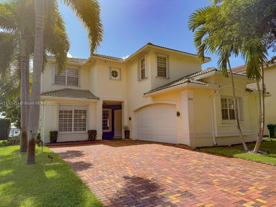 Stunning lakefront home with 4 bedrooms, 3 baths, private pool and sunset views. European-style gola kitchen with quartz countertops, pantry and elegant finishes. Spacious primary suite with office, his & hers bathrooms, walk-in closets and balcony. 1 bedroom + full bath on first floor. Loft and laundry upstairs. Features include spanish porcelain floors, high ceilings, accordion shutters, 2 a/c units and automated blinds. Fenced backyard with covered patio, misting system, garden lights and fruit trees. Driveway for 5 cars and garage with extra refrigerator. Cable & internet included. Tenant responsible for pool and lawn. Located in gated sunset falls with tennis, basketball, gym, playground and pool. Furniture negotiable.