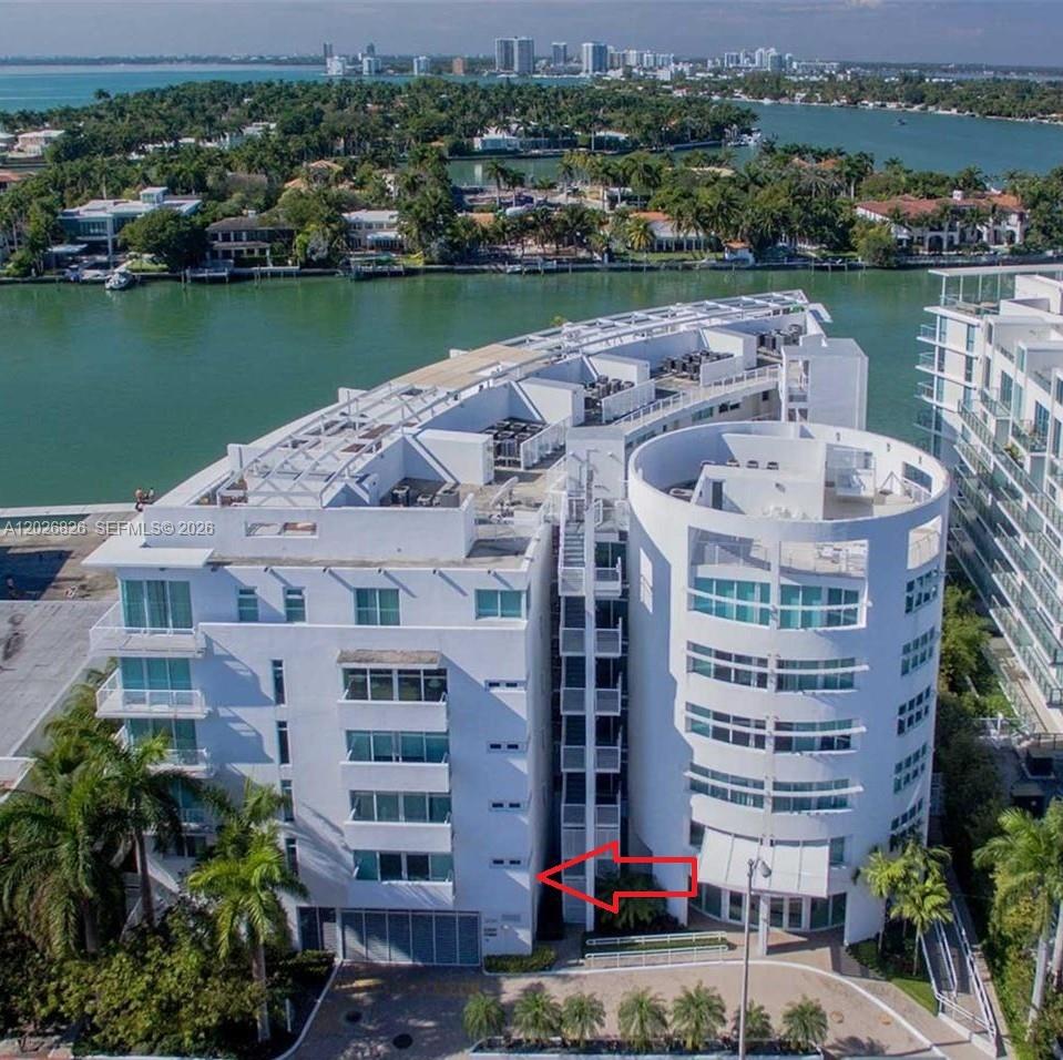 Remodeled 2 bedroom, 2 full bathroom and 1 powder room apartment with new laminated floors. Excellent location as an investment or residence in Miami Beach. 1 block away from the beach and boat accessible! Ample rooms with lots of closet space, washer & dryer. Amenities include a waterfront deck and swimming pool area with Jacuzzi, gym /exercise room and concierge. Walking distance to stores, restaurants, hair salons, coffee shops, and all attractions mid beach offers just steps away from your home. Easy to show.