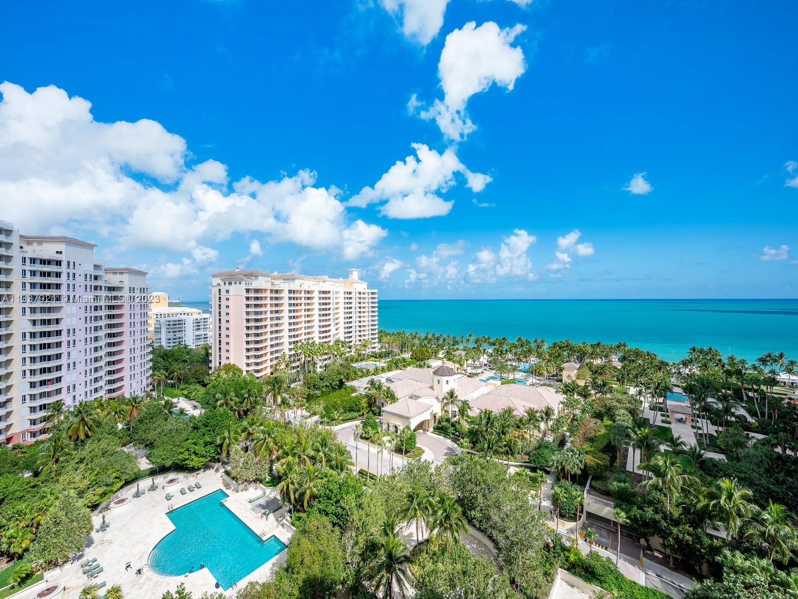 The very best of Key Biscayne and a rare opportunity! Very few of these spacious 4,200 SF two level homes were built at the Ocean Club. The residence offers the comfort of a large home combined with luxury beachfront resort amenities. Throughout the open floorplan, enjoy spectacular views of beautiful sunrises over the ocean and unobstructed sunsets that illuminate the island,
Bill Baggs State Park and the Biscayne Bay. A private elevator opens to a spacious and bright first floor that is ideal for entertaining with two separate living areas, formal dining, elegant bar, powder room, oversized eat in kitchen and a bedroom suite. The second floor offers three suites (a fifth bedroom is possible), family room and conveniently located laundry.
