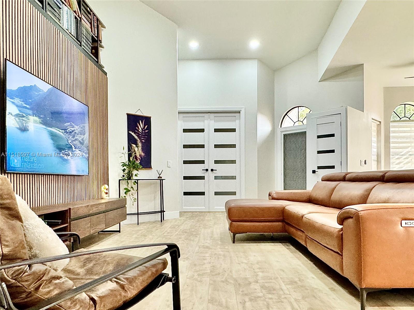 Spectacularly finished home in the active community of Lexington Club! This 2/2 +Den open concept floor plan is bright and thrilling! Center-pieced by custom kitchen cabinetry with internal accessories, all new appliances and elegant feature wall drawing your eyes up the vaulted ceiling. The living area opens up to a bright indoor/outdoor sunroom with calming garden view. Other touches include modern bathroom fixtures such as fully automated toilets, marble floors, waterfall shower and body sprays. This community offers abundant activities for all residents to enjoy including pool, pickle ball, and tennis courts. Association covers roof, exterior maintenance and repairs, cable, alarm system, internet and water.