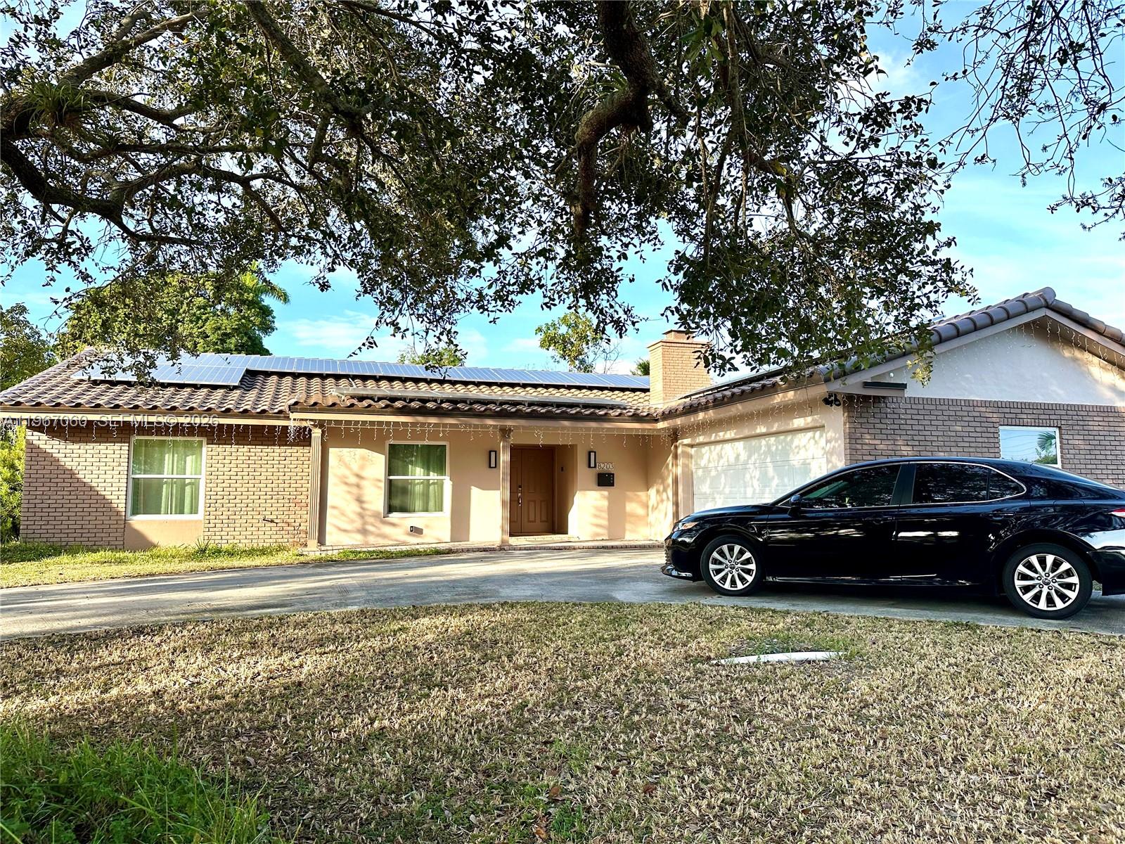 Welcome to a true Coral Springs gem — a fully updated 4-bedroom, 2-bath pool home situated on an oversized 14,482 sq ft lot with no HOA.

This bright and spacious single-story residence offers nearly 2,000 sq ft of living space with a seamless open floor plan, updated kitchen featuring stainless steel appliances and modern countertops, and beautifully maintained ceramic and laminate flooring throughout.

Enjoy Florida living at its finest with a private screened-in pool, mature landscaping, and a generously sized backyard perfect for entertaining or relaxing.

Major upgrades include:
• Impact windows and doors
• New roof (2023)
• Solar panel system for significantly reduced energy costs
• 2-car garage
• Circular driveway

CBS construction and flat tile roof add long-term durability and value.