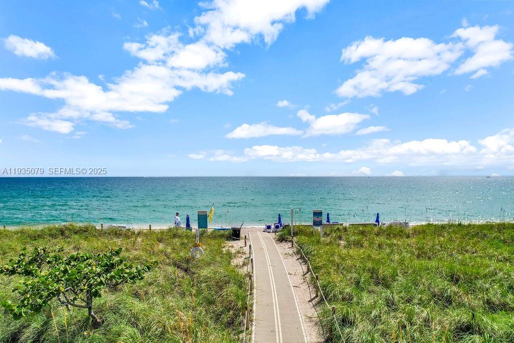 Located in the highly coveted Bal Harbour 101 at 10155 Collins Avenue, this beautifully updated residence offers an exceptional opportunity to own in one of Bal Harbour’s most prestigious oceanfront buildings. Perfectly positioned on the 11th floor with northern exposure, the unit enjoys sweeping city and ocean views while being just steps from the sand, the Bal Harbour Beach walking path, and the world-famous Bal Harbour Shops. The building delivers a true resort-style lifestyle with full beach and pool service, valet parking, tennis court, fitness center, on-site restaurant, and 24-hour concierge and security. The residence has been tastefully renovated and is currently furnished with a tenant in place, featuring two bedrooms, three and a half bathrooms, plus a converted den, creating an ideal layout for comfortable full-time living, seasonal enjoyment, or an income-producing luxury investment.