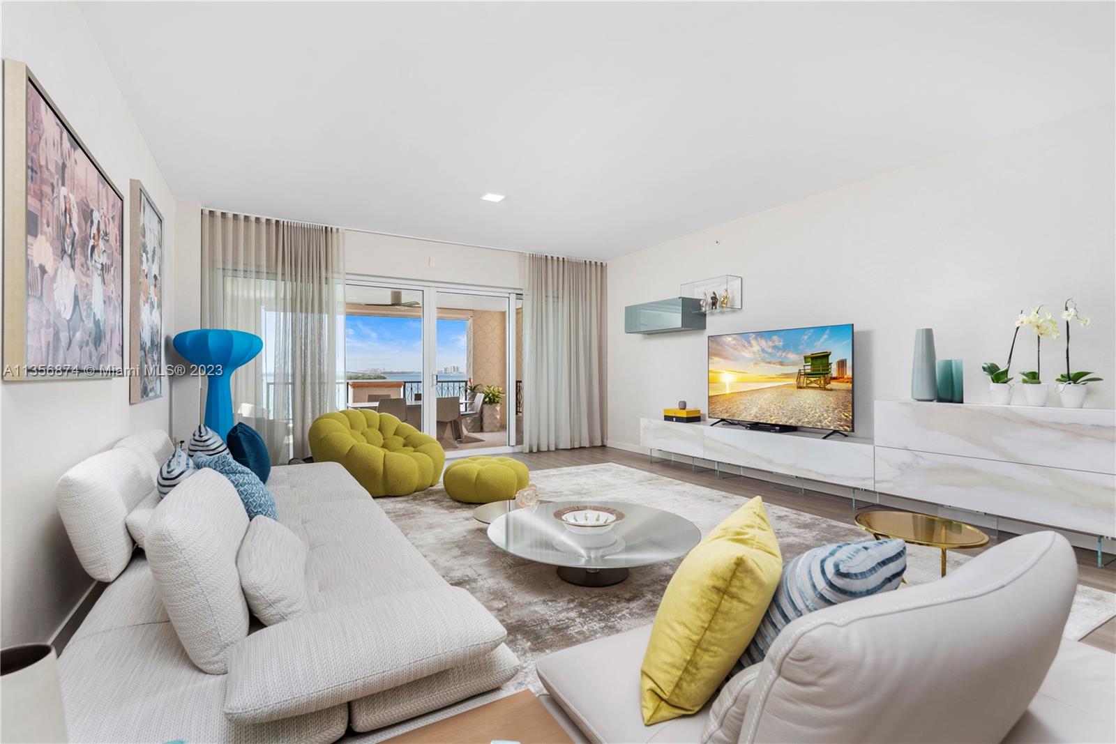 Visit this stunning 5th floor Bayview unit on Fisher Island! It encompasses 2,750 sq. ft. interior, 3 bedrooms, 3.5 baths, completely renovated, expansive terraces with Miami Downtown skyline and Bay views, flow through unit overlooking with east and west views. Professionally designed by Roche Bobois, the unit features an open layout with exquisite oak wood floors throughout, a state-of-the-art semi opened kitchen and bathrooms, impact glass doors, automatic window treatments, spacious bedrooms with walk-in closets and many more features. Live the Fisher Island lifestyle in this private oasis!