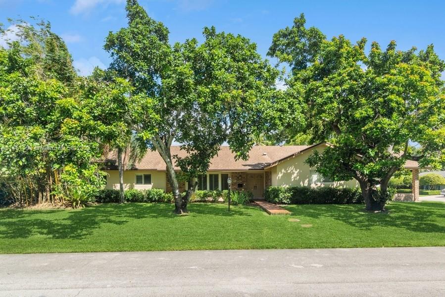 Beautiful, updated N Pinecrest pool home! 3 bedrooms, plus an office, 3 baths, family room and a bonus playroom/recreation room. Fabulous custom kitchen with a center island, Jenn-Aire six burner cooktop, double ovens, banquette seating and built-in desk. The kitchen opens to the family room with handsome built-ins, and French doors leading to the lushly landscaped pool/patio. Impact windows and doors, with the exception of the front door, side door and cabana door, plantation shutters, roof is 8 years old and new AC September 2023. Located on a quiet, picturesque no thru street. A must see!  Kindly give 24 hours notice for showings.
Actual total living area per appraisal is 2772 sq. ft. (appraisal is in attachments).